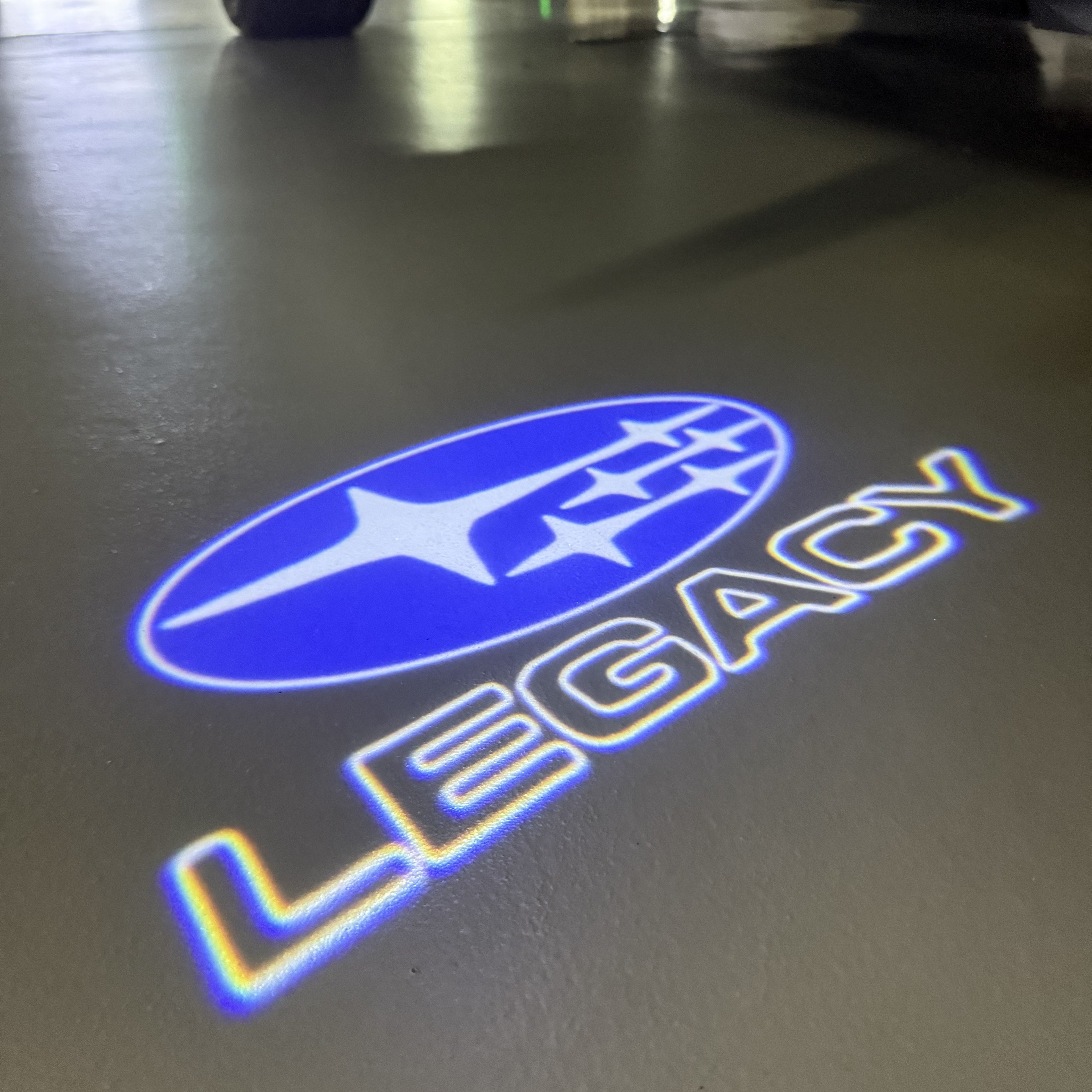 SUBARU LEGACY LOGO PROJECROTR LIGHTS (quantity 1 = 1 sets/2 door lights) Nr.03A38