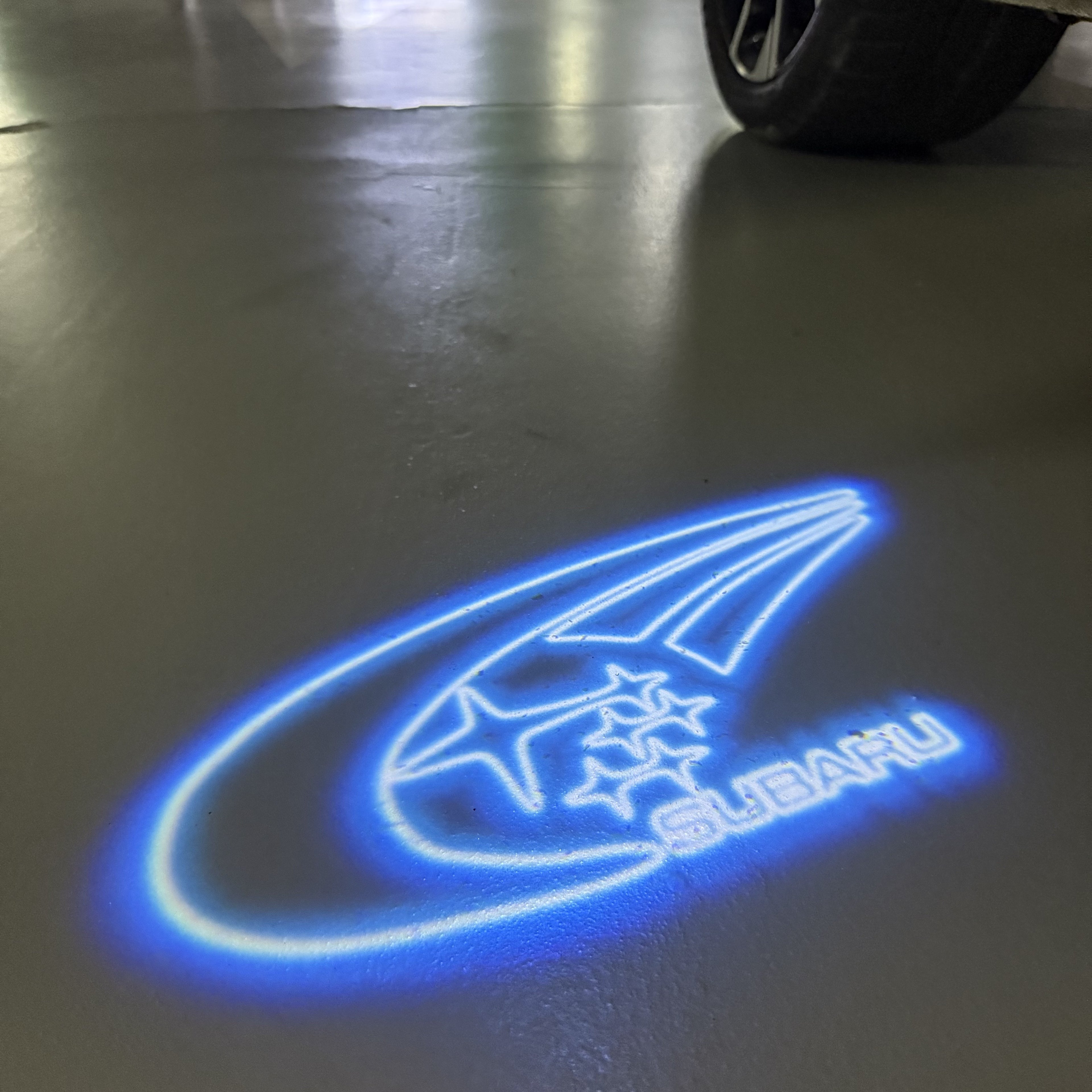 SUBARU ORIGINAL LOGO PROJECROTR LIGHTS (quantity 1 = 1 sets/2 door lights) Nr.11