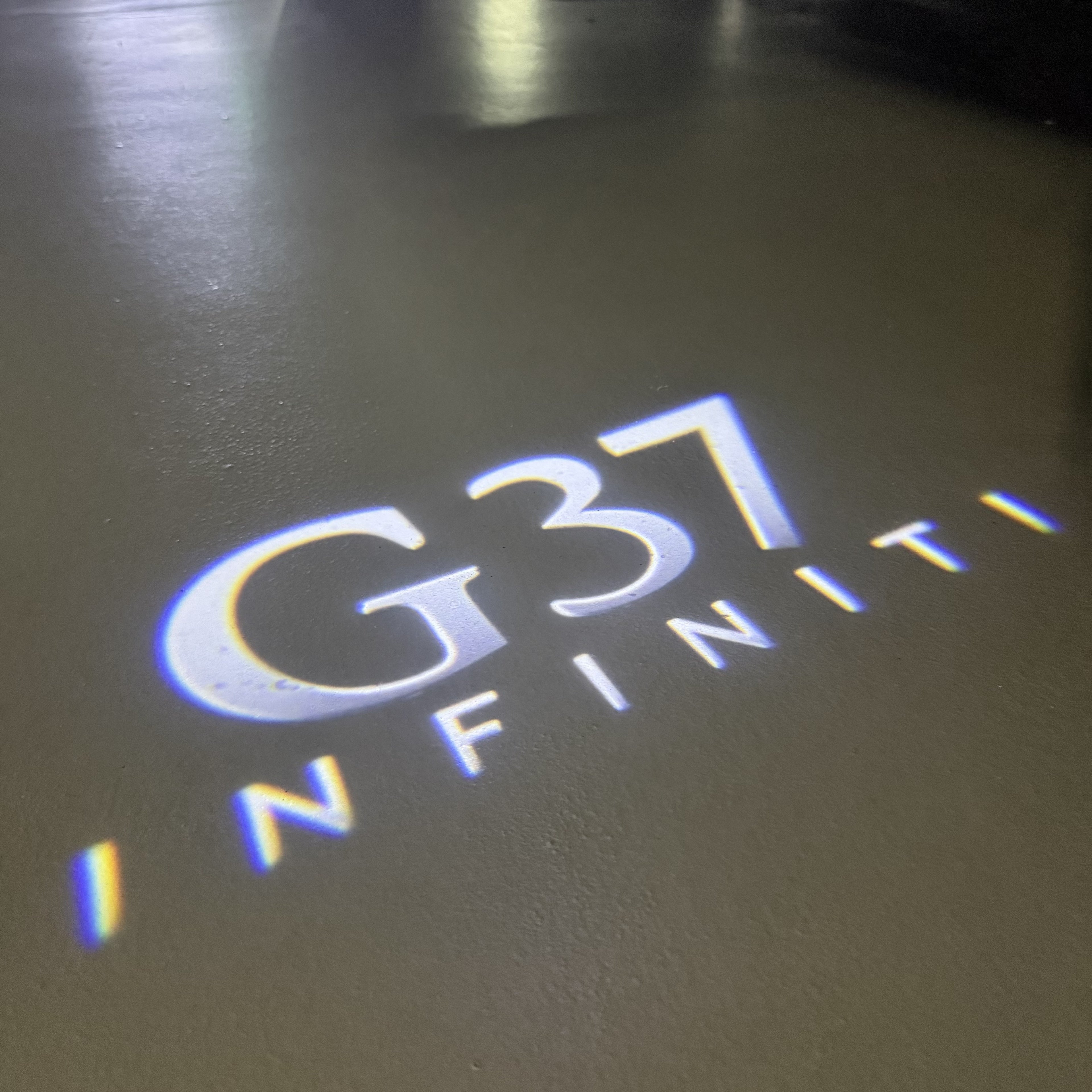 INFINTI QX56 LOGO PROJECROTR LIGHTS Nr.74 (Menge 1 = 1 Sets/2 Türleuchten)