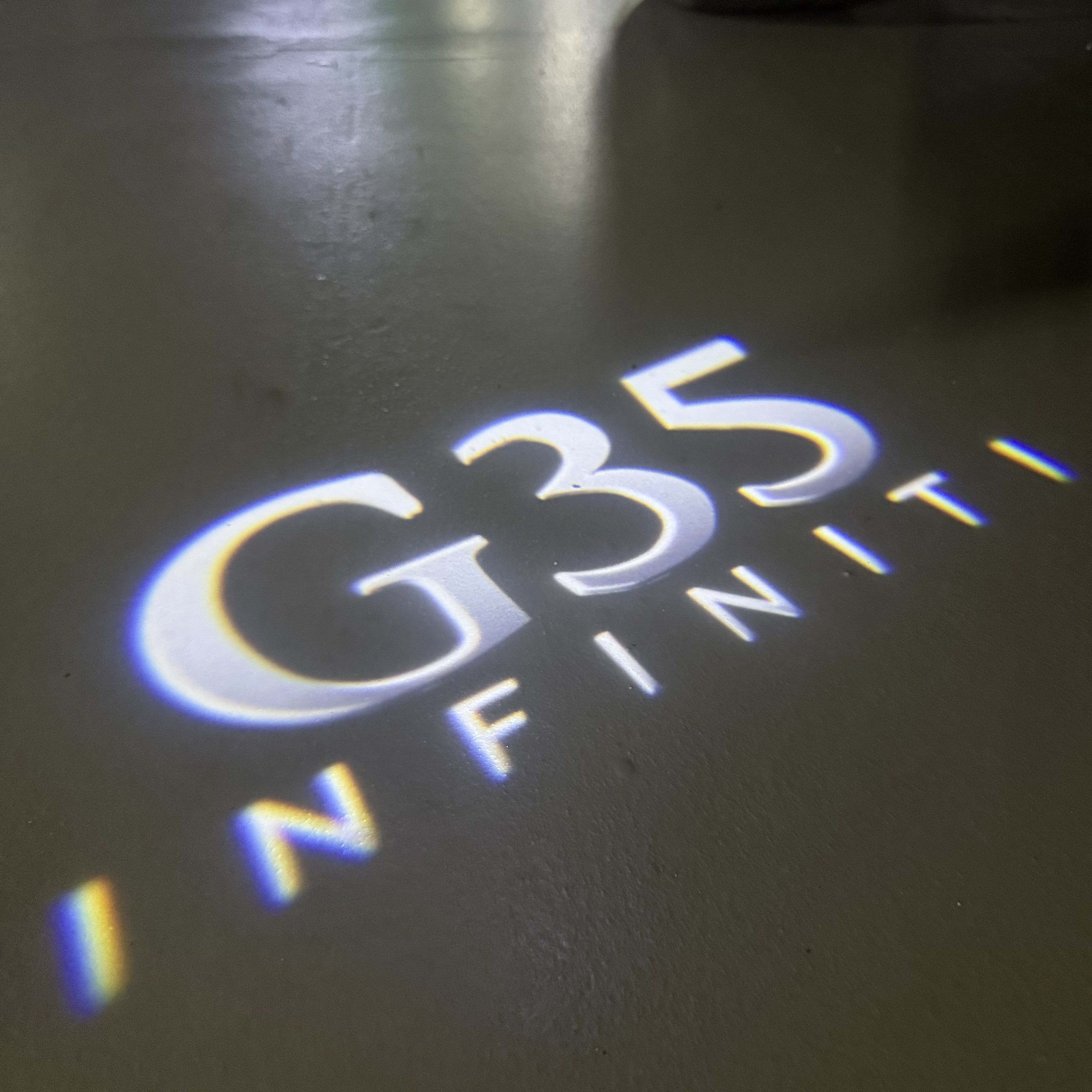 INFINTI QX56 LOGO PROJECROTR LIGHTS Nr.74 (Menge 1 = 1 Sets/2 Türleuchten)