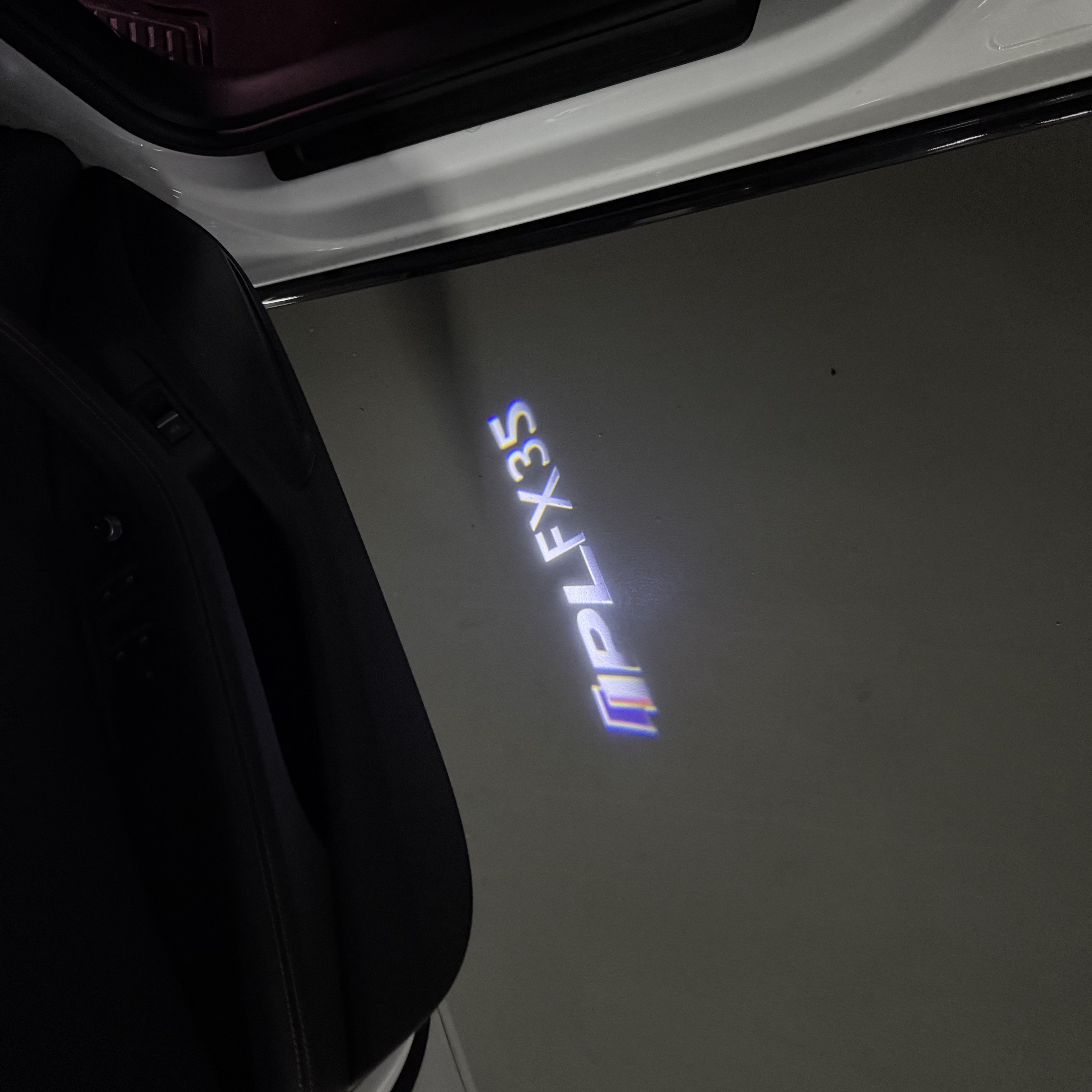 INFINTI QX56 LOGO PROJECROTR LIGHTS Nr.74 (Menge 1 = 1 Sets/2 Türleuchten)
