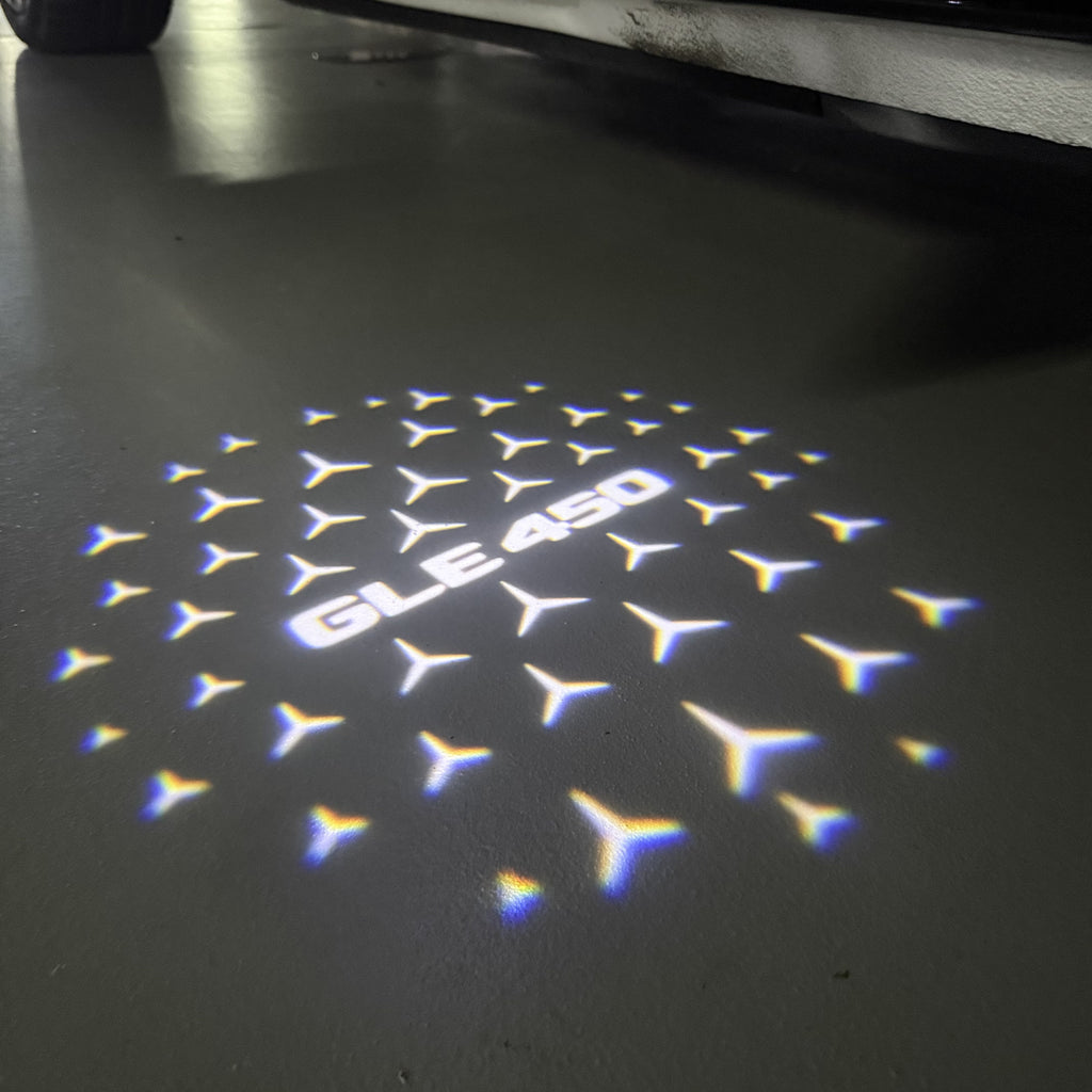 LUCI PROIETTORI LOGO MERCEDES BENZ Nr.03 (quantità 1 = 1 set / 2 luci porta)