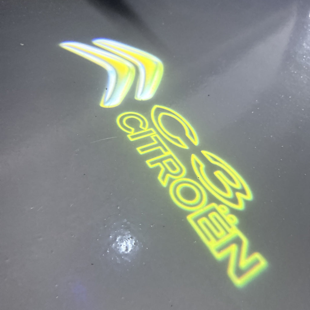 CITROËN C3   LOGO PROJECTOT LIGHTS (quantity 1 = 1 sets/2 door lights) Nr.6024q0t0153
