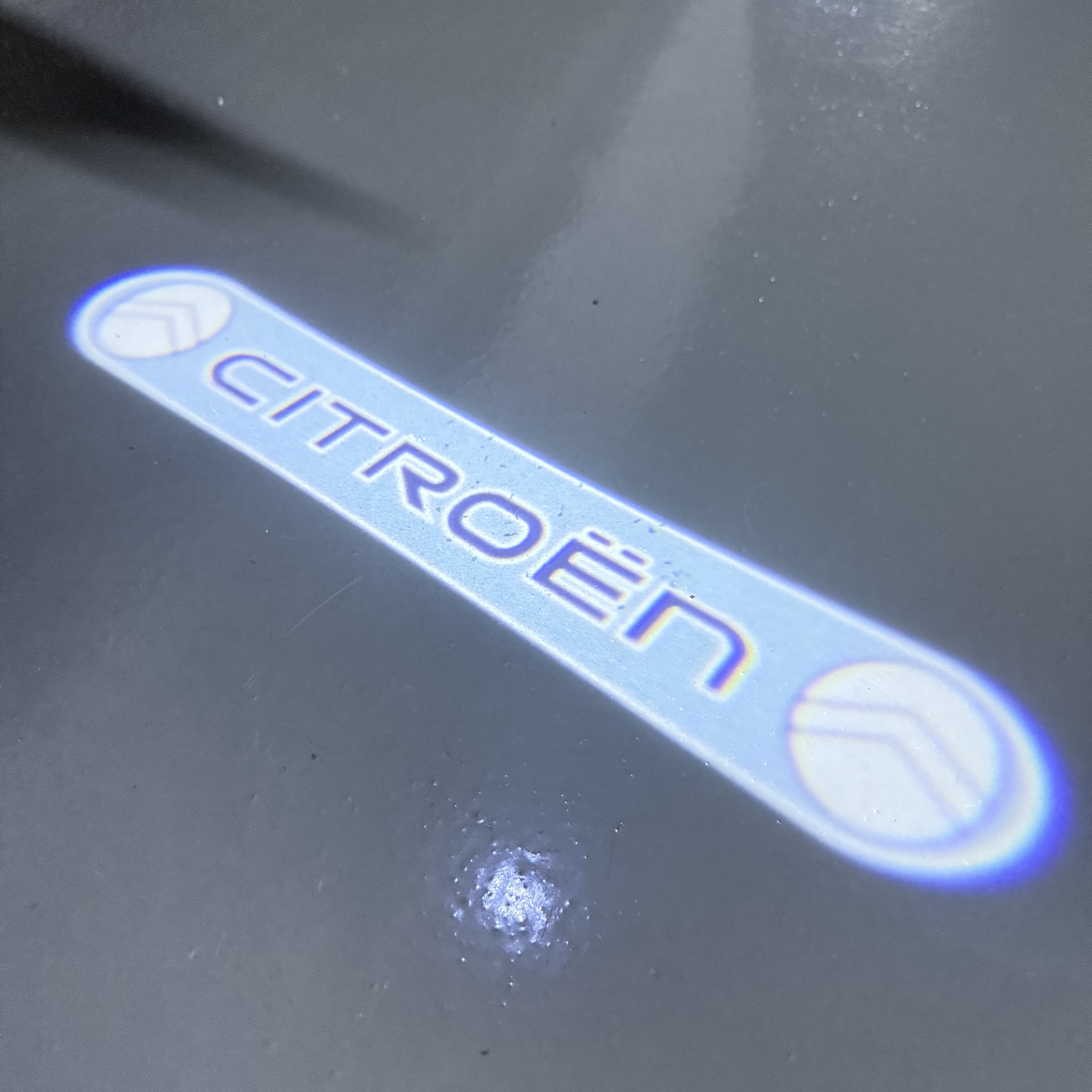 CITROËN Original   LOGO PROJECTOT LIGHTS (quantity 1 = 1 sets/2 door lights) Nr.6024q0t0140