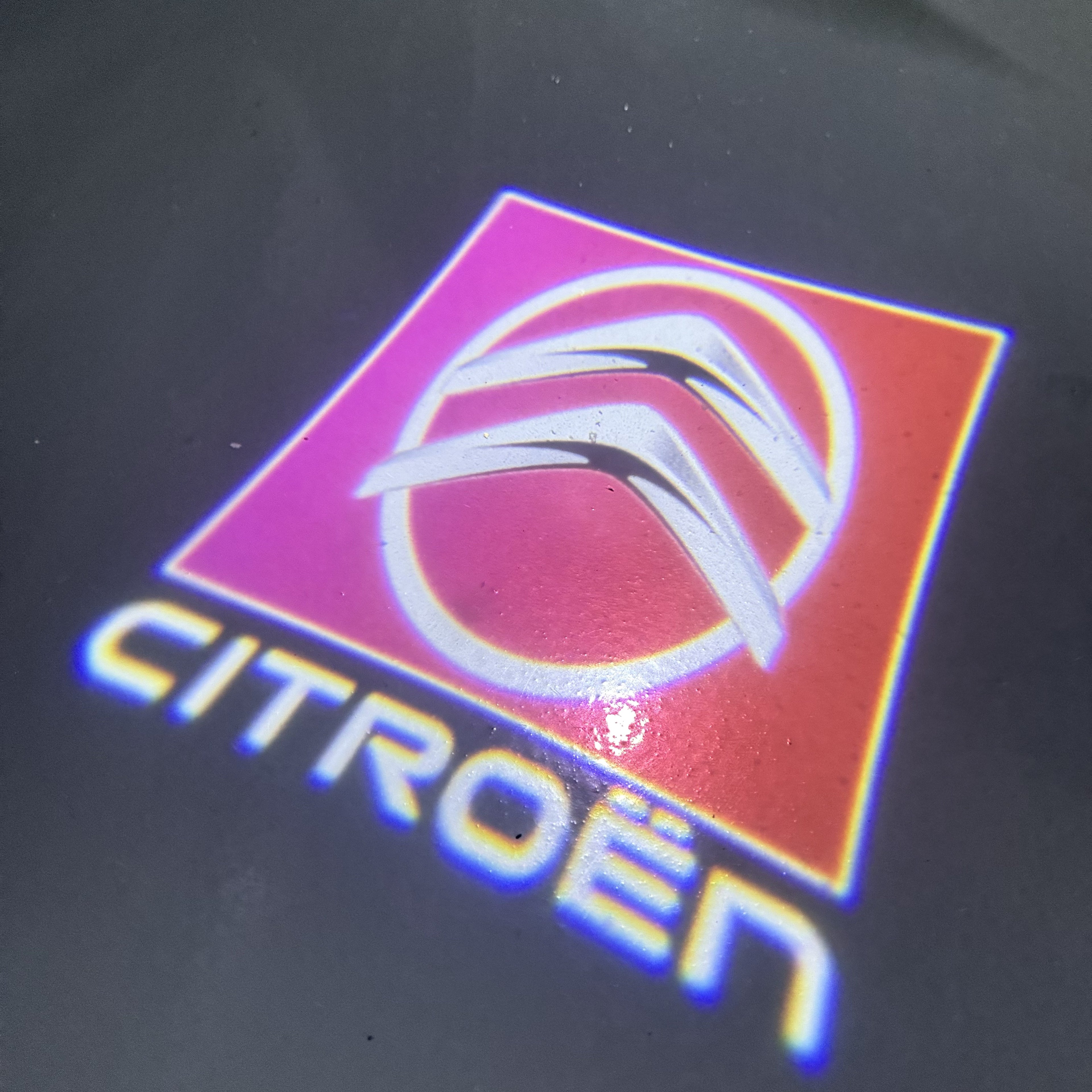 CITROËN Original   LOGO PROJECTOT LIGHTS (quantity 1 = 1 sets/2 door lights) Nr.6024q0t0144