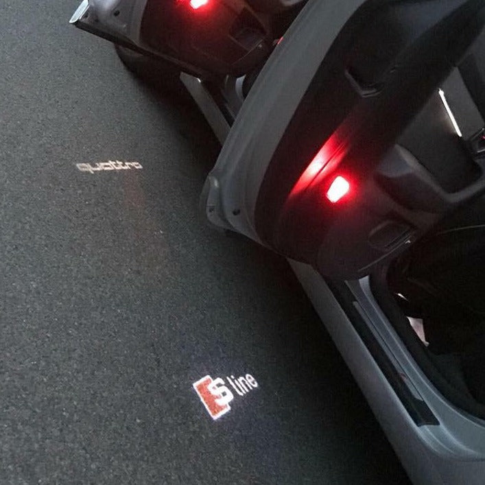 AUDI LOGO PROJECTOT LIGHTS Nr.100 (quantità 1 = 2 Logo Films /2 luci porta)