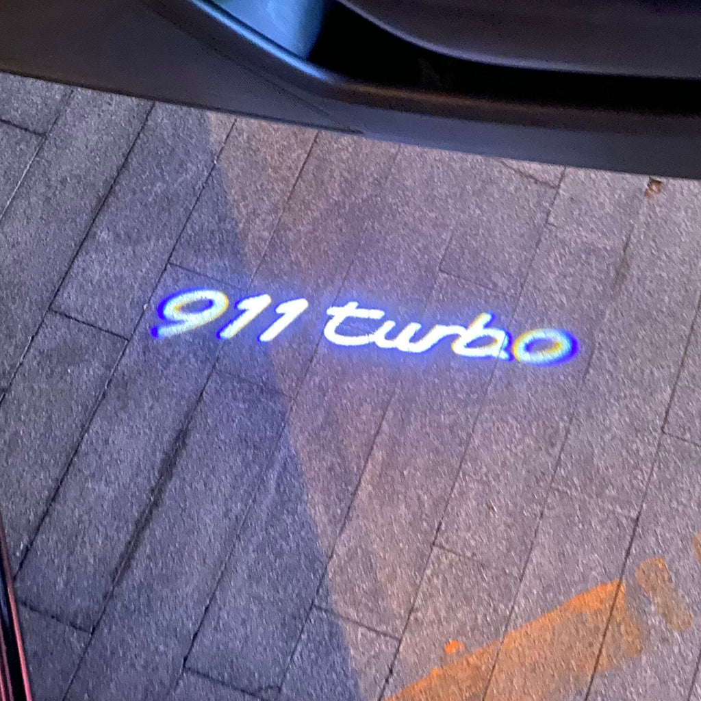 PORSCHE LOGO PROJECTOT LIGHTS Nr.49 (cantidad 1 = 2 logo película / 2 luces de puerta)