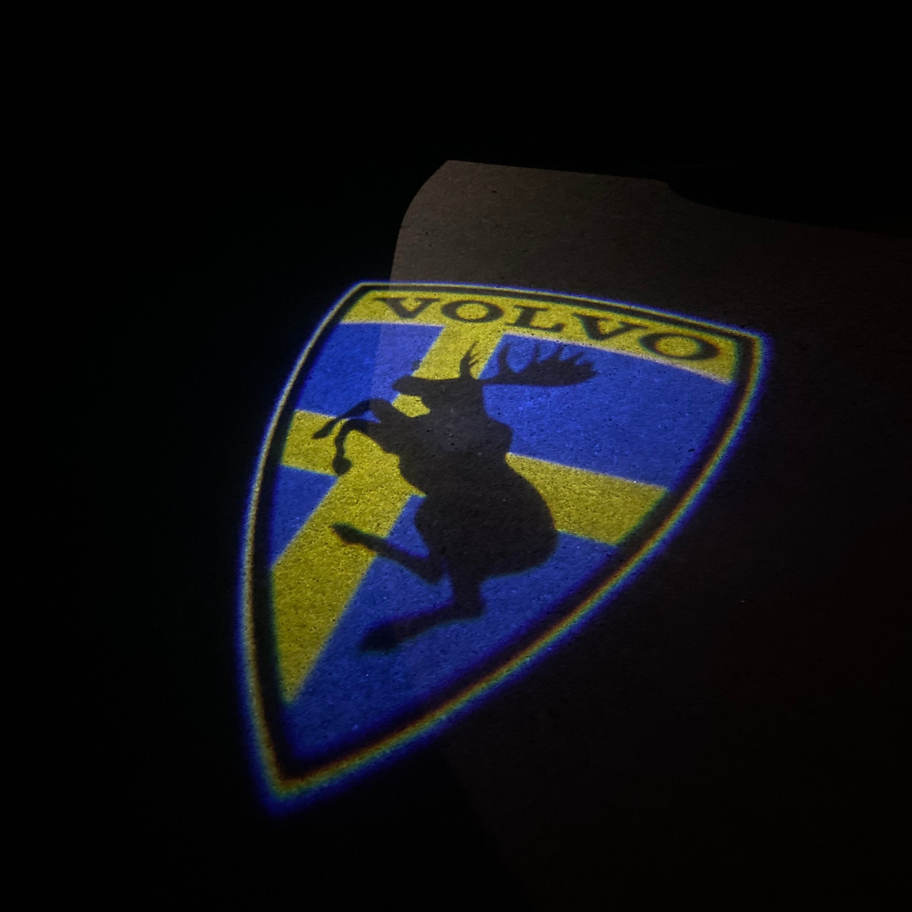 LUCES DEL PROYECTOR DEL LOGOTIPO Volvo Nr.66 (cantidad 1 = 2 Película de logotipo / 2 luces de puerta)
