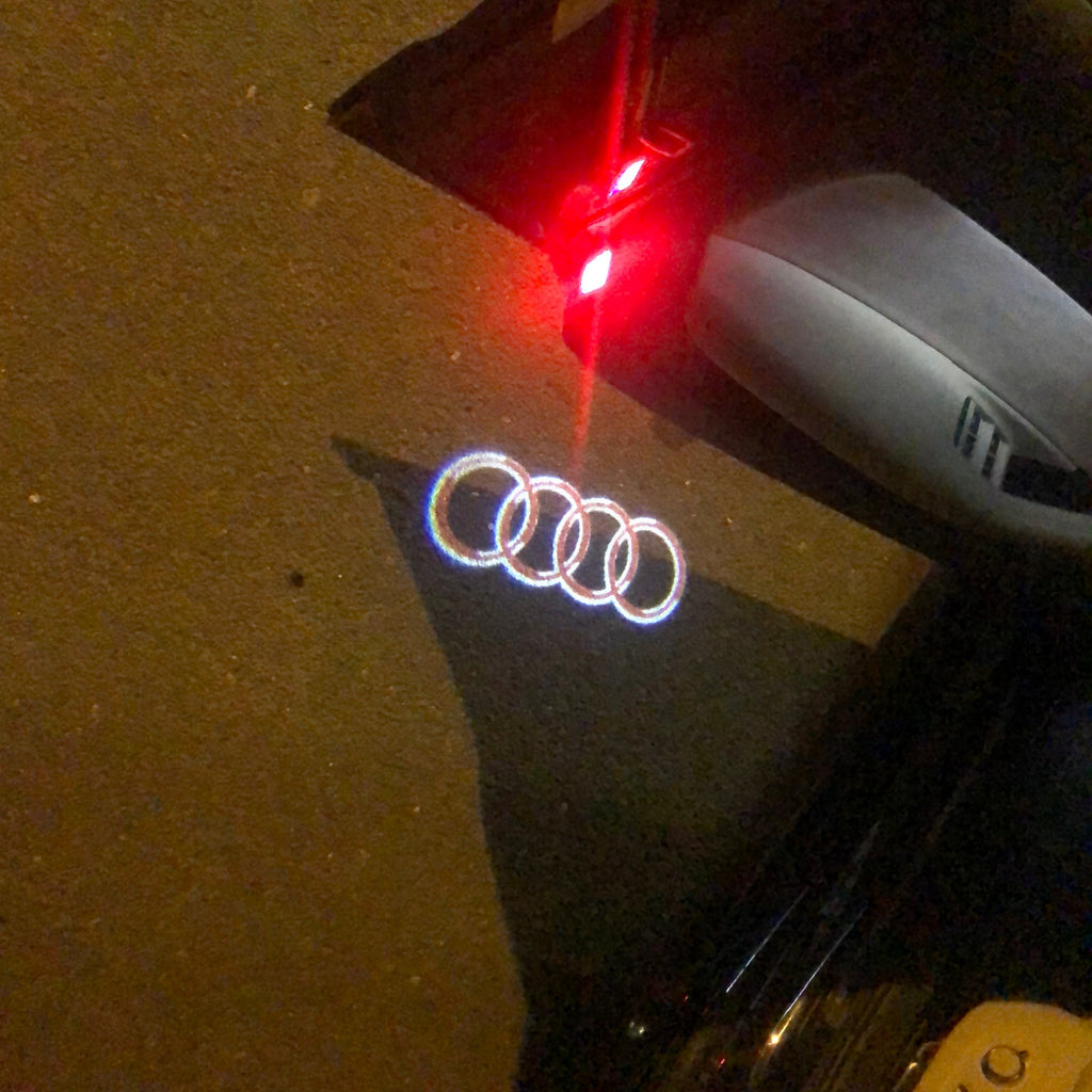 AUDI RING LOGO PROJECTOT LIGHTS Nr.143 (quantité 1 = 2 Logo Films /2 feux de porte)