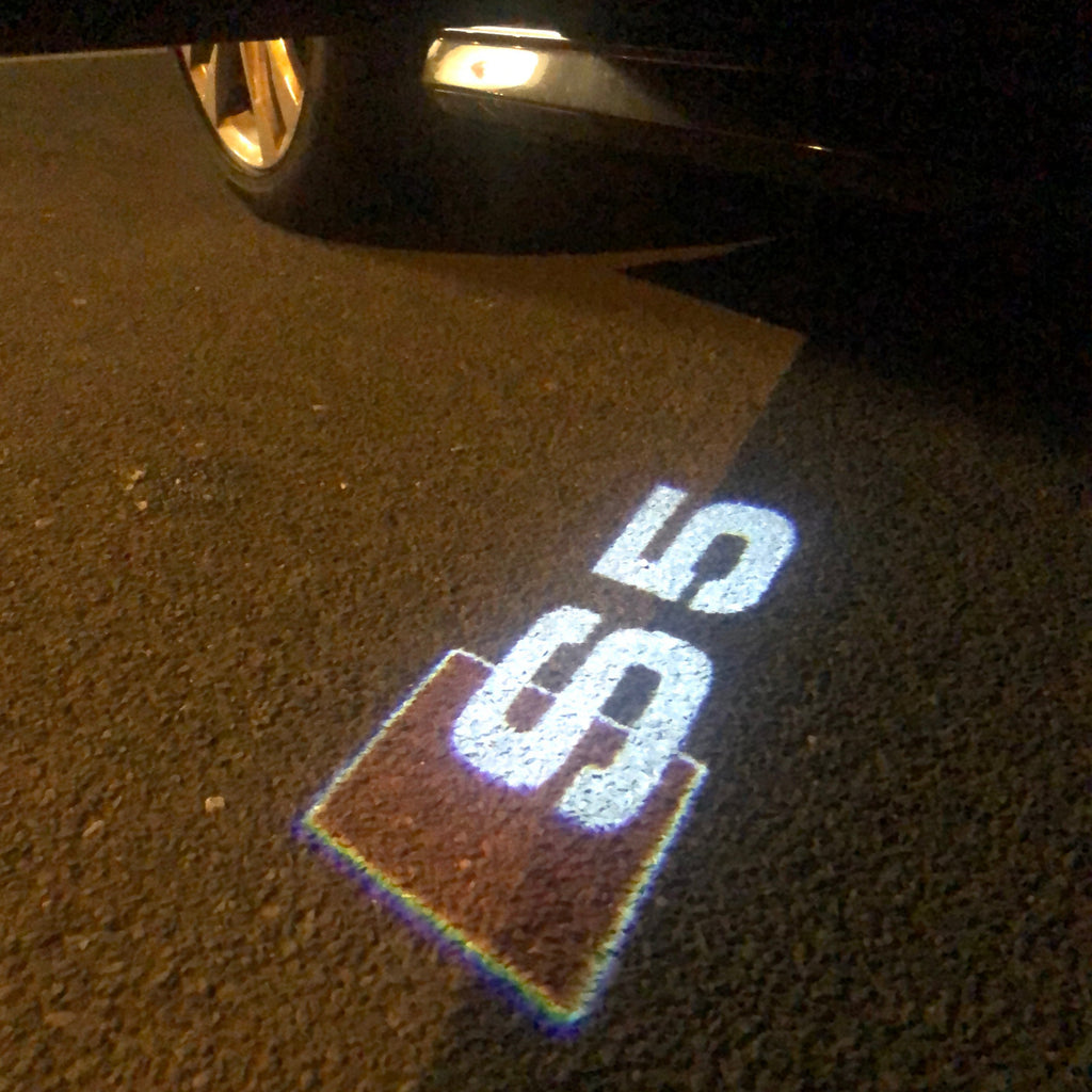 LAMPES DE PROJECTEUR AUDI LOGO N ° 26 (quantité 1 = 2 films de logo / 2 lumières de porte)