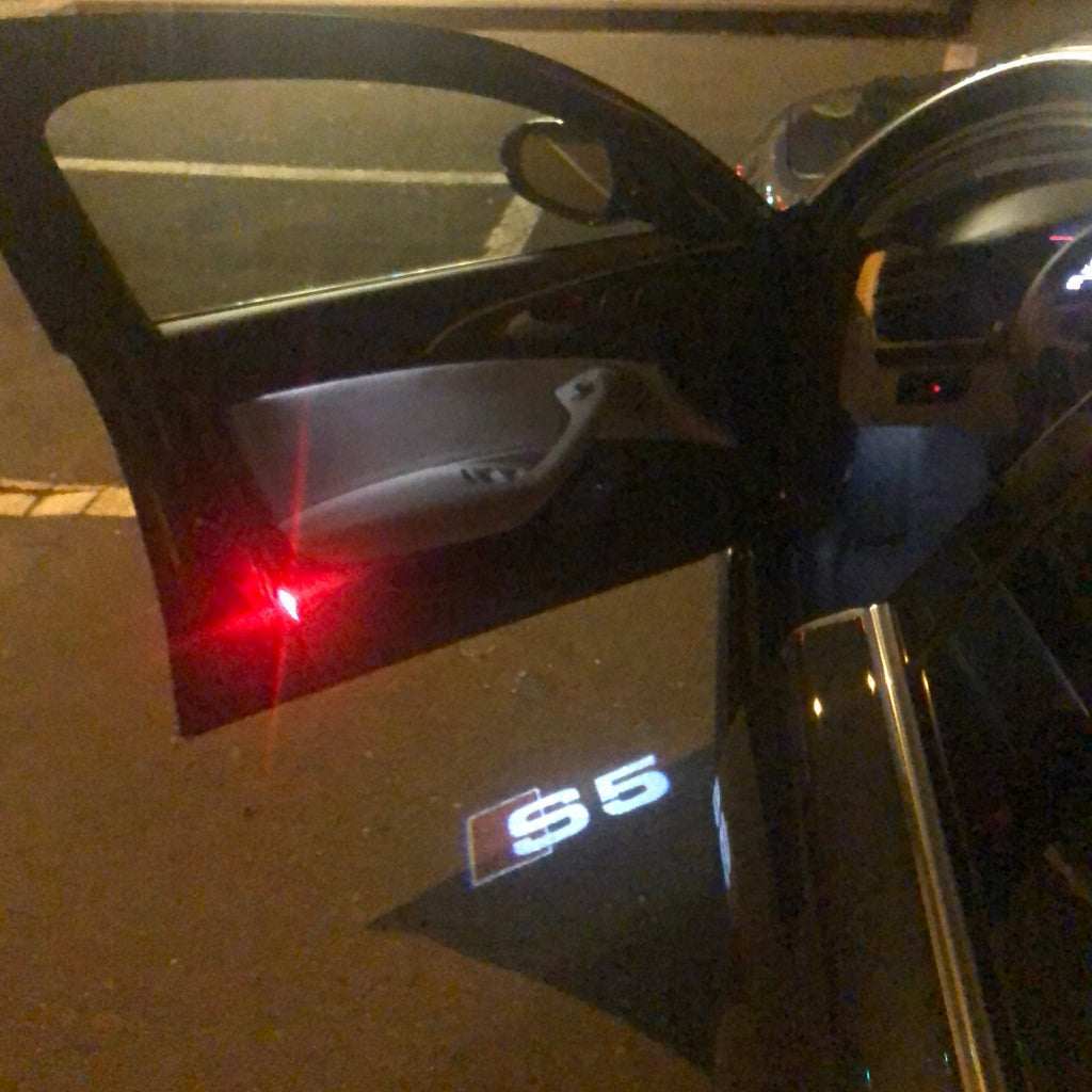 LAMPES DE PROJECTEUR AUDI LOGO N ° 26 (quantité 1 = 2 films de logo / 2 lumières de porte)