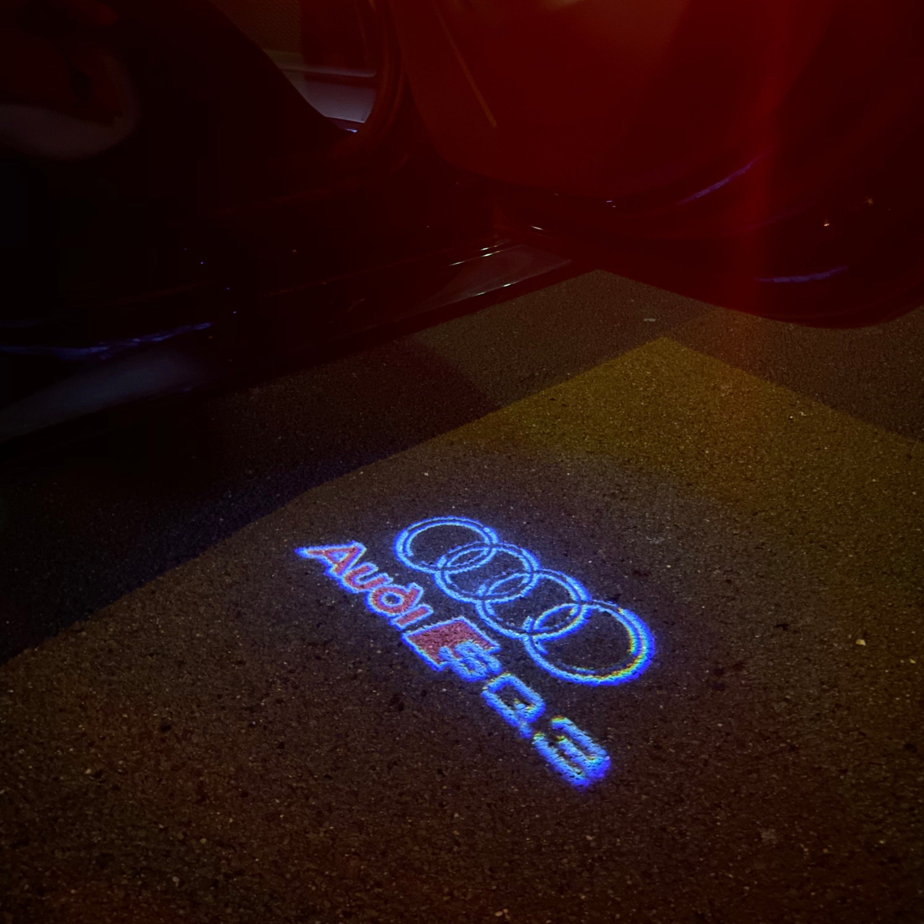 AUDI LOGO PROJECTOT LIGHTS Nr.254 (quantité 1 = 2 Logo Films /2 feux de porte)