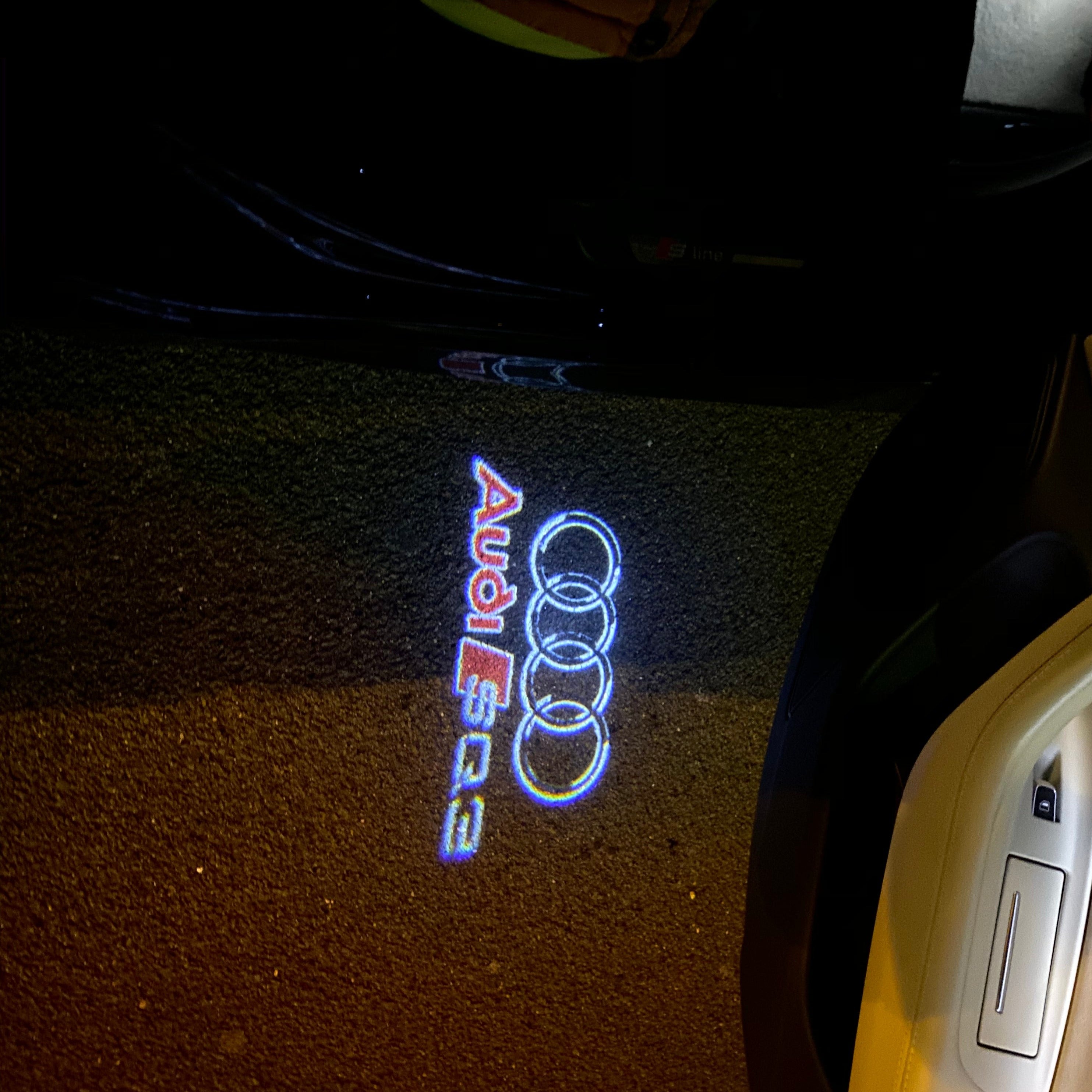 AUDI LOGO PROJECTOT LIGHTS Nr.254 (quantité 1 = 2 Logo Films /2 feux de porte)