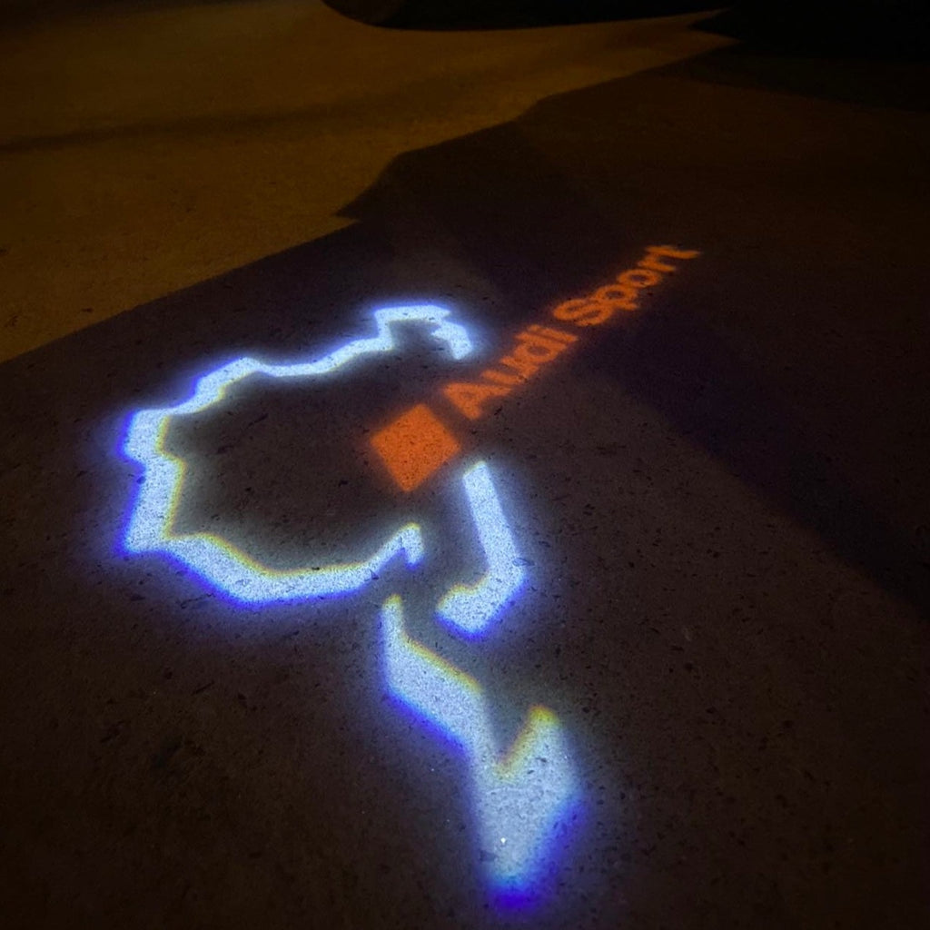 PROJECTEUR AUDI LOGO LIGHTS Nr.31 (quantité 1 = 2 Logo Films / 2 feux de porte)