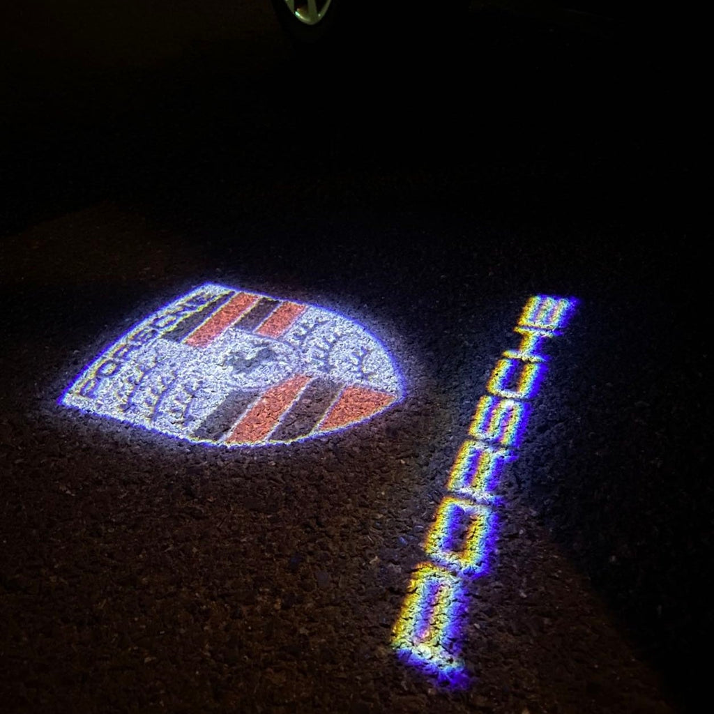 LUCI PROIETTORI LOGO PORSCHE Nr.36 (quantità 1 = 2 Logo Film / 2 luci porte)