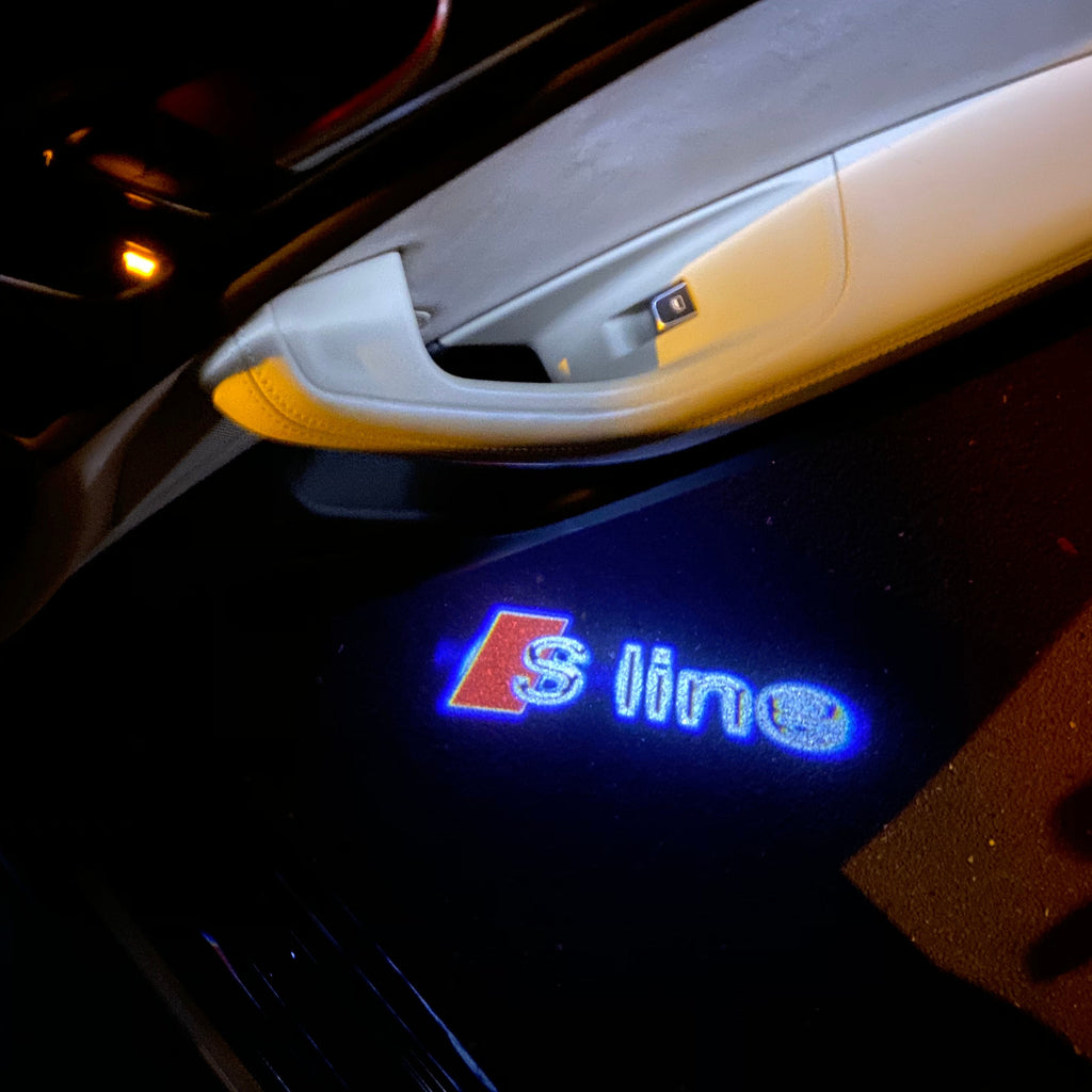 AUDI SLINE LOGO PROJECROTR LIGHTS Nr.11 (Menge 1 = 2 Logofolien /2 Türleuchten)