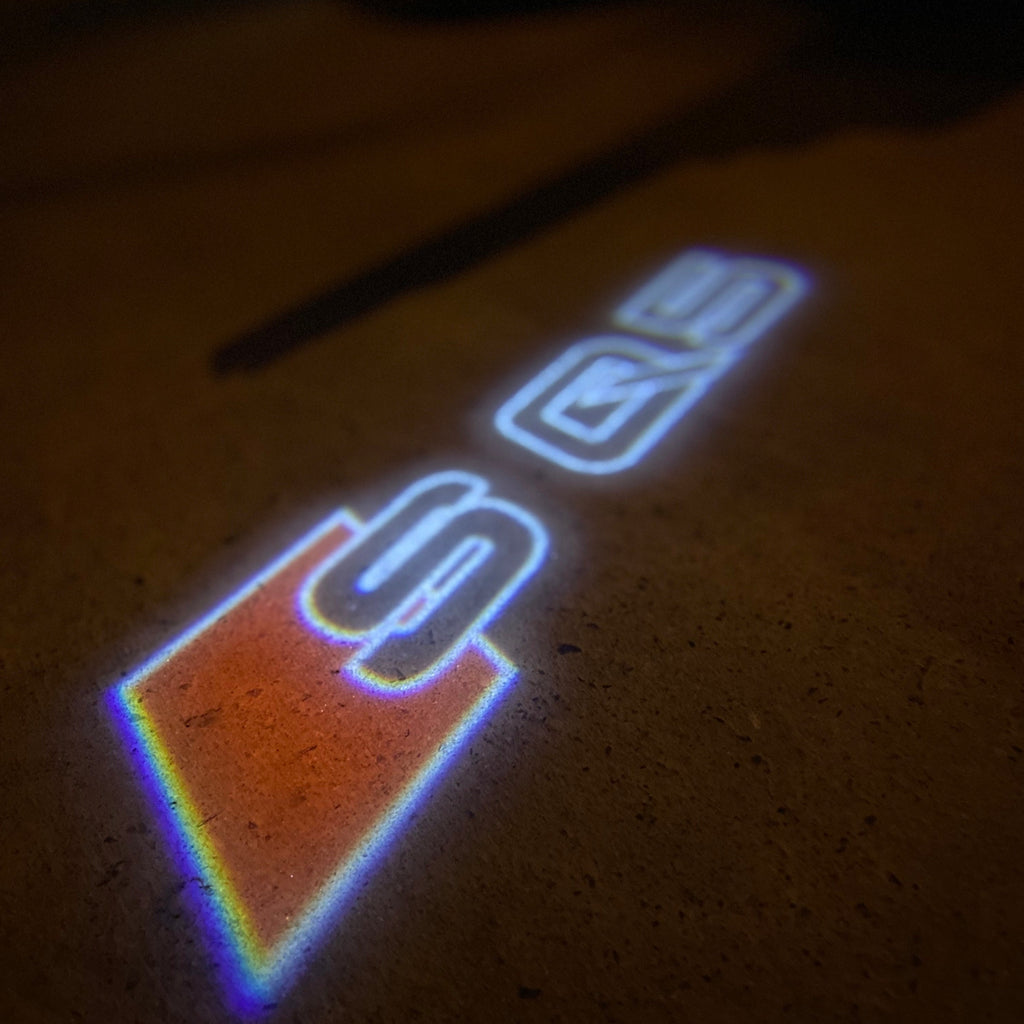 AUDI LOGO PROJECTOT LIGHTS Nr.19 (quantità 1 = 2 Logo Films /2 luci porta)