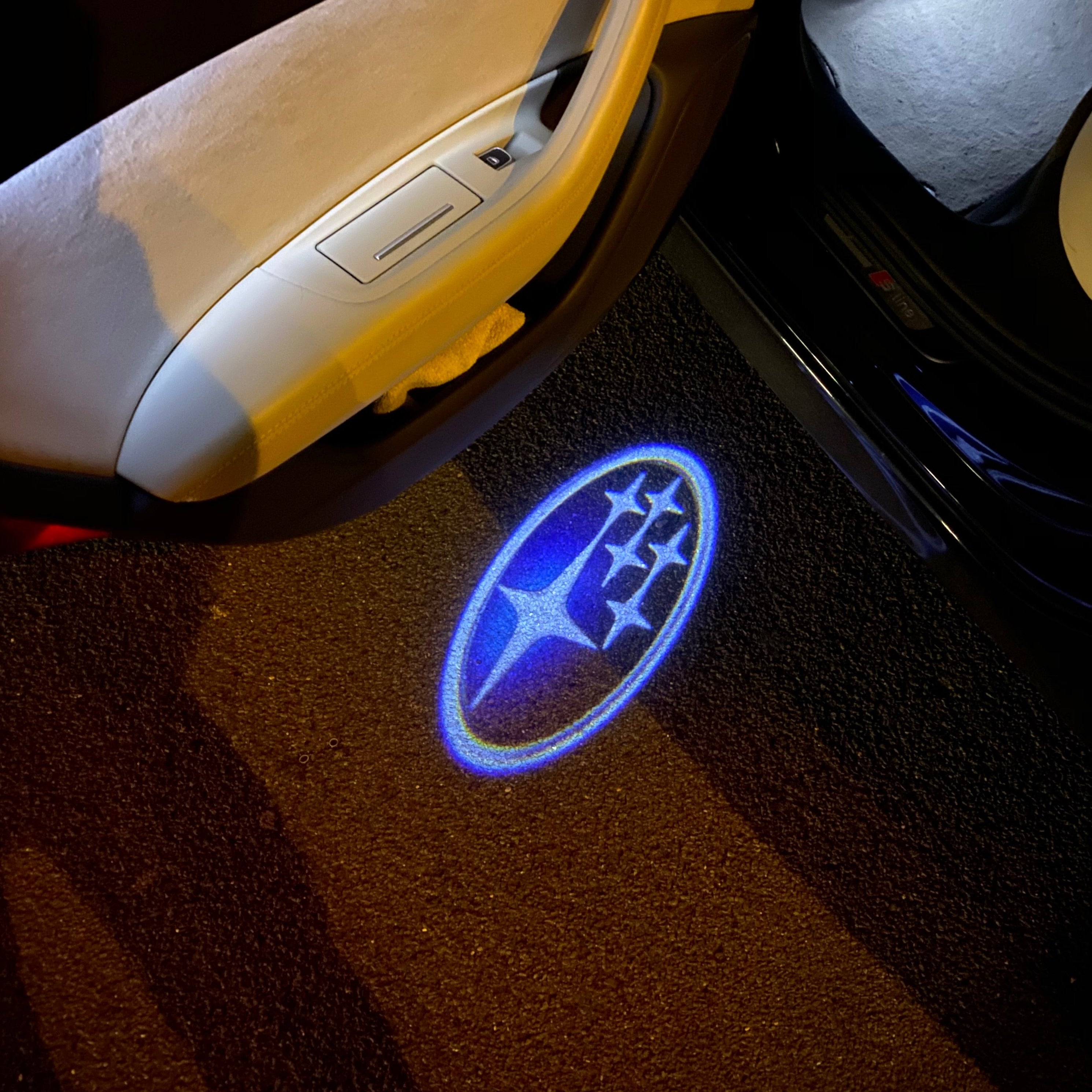 SUBARU LOGO PROJECROTR LIGHTS (quantity 1 = 1 sets/2 door lights) Nr.03A1