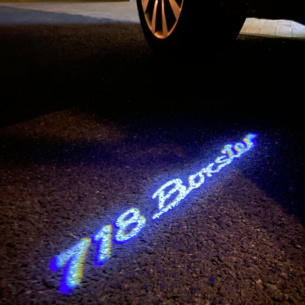 LUCES DE PROYECTOR LOGO PORSCHE Nr.58 (cantidad 1 = 2 Película con Logo / 2 luces de puerta)