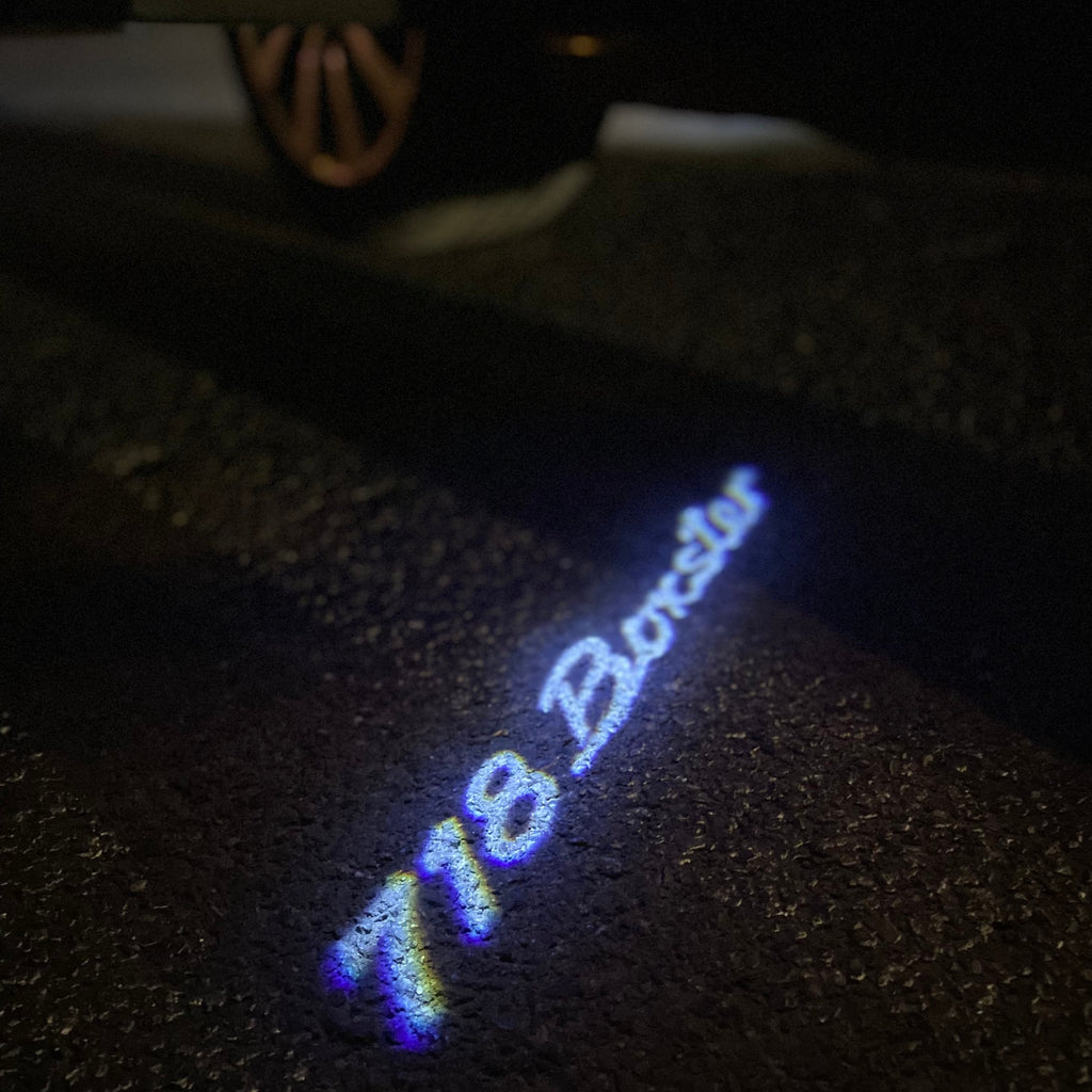 PORSCHE BOXSTER  LOGO PROJECTOT LIGHTS Nr.8018 (quantity  1 =  2 Logo Film /  2 door lights)