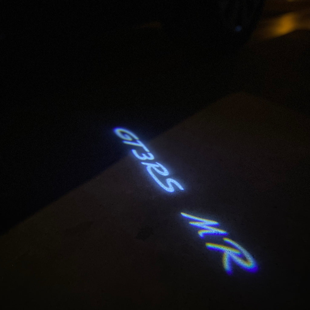 LUCES DE PROYECTOR DE LOGOTIPO ORIGINAL PORSCHE N ° 03 (cantidad 1 = 2 Película de logotipo / 2 luces de puerta)