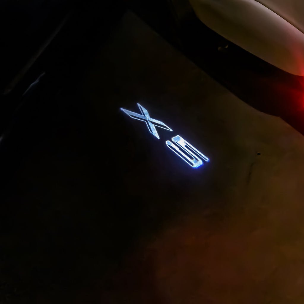 BMW X5 LOGO PROJECTOT LIGHTS Nr.18 (cantidad 1 = 1 juego/2 luces de puerta)