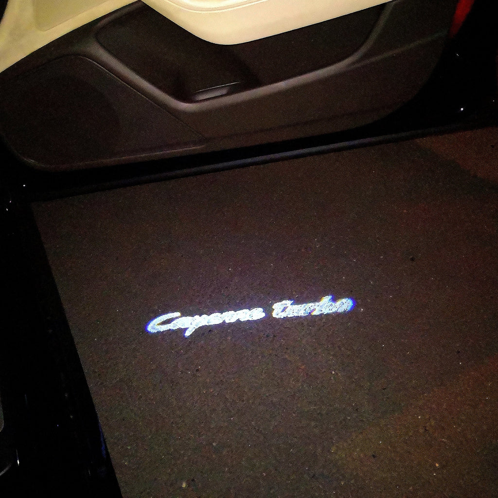 LUCI PROIETTORI LOGO PORSCHE Cayenne turbo Nr.28 (quantità 1 = 2 Logo Film / 2 luci porte)