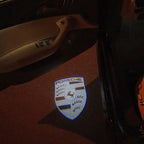 PORSCHE ORIGINAL LOGO PROJECTOT LIGHTS Nr.06 (cantidad 1 = 2 logo película / 2 luces de puerta)