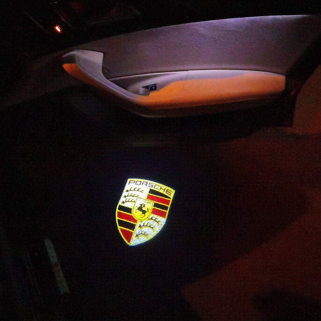 LUCI PROIETTORI LOGO ORIGINALI PORSCHE Nr.03 (quantità 1 = 2 Logo Film / 2 luci porta)