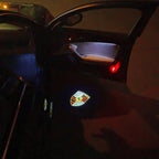 LUCI PROIETTORI LOGO ORIGINALI PORSCHE Nr.03 (quantità 1 = 2 Logo Film / 2 luci porta)