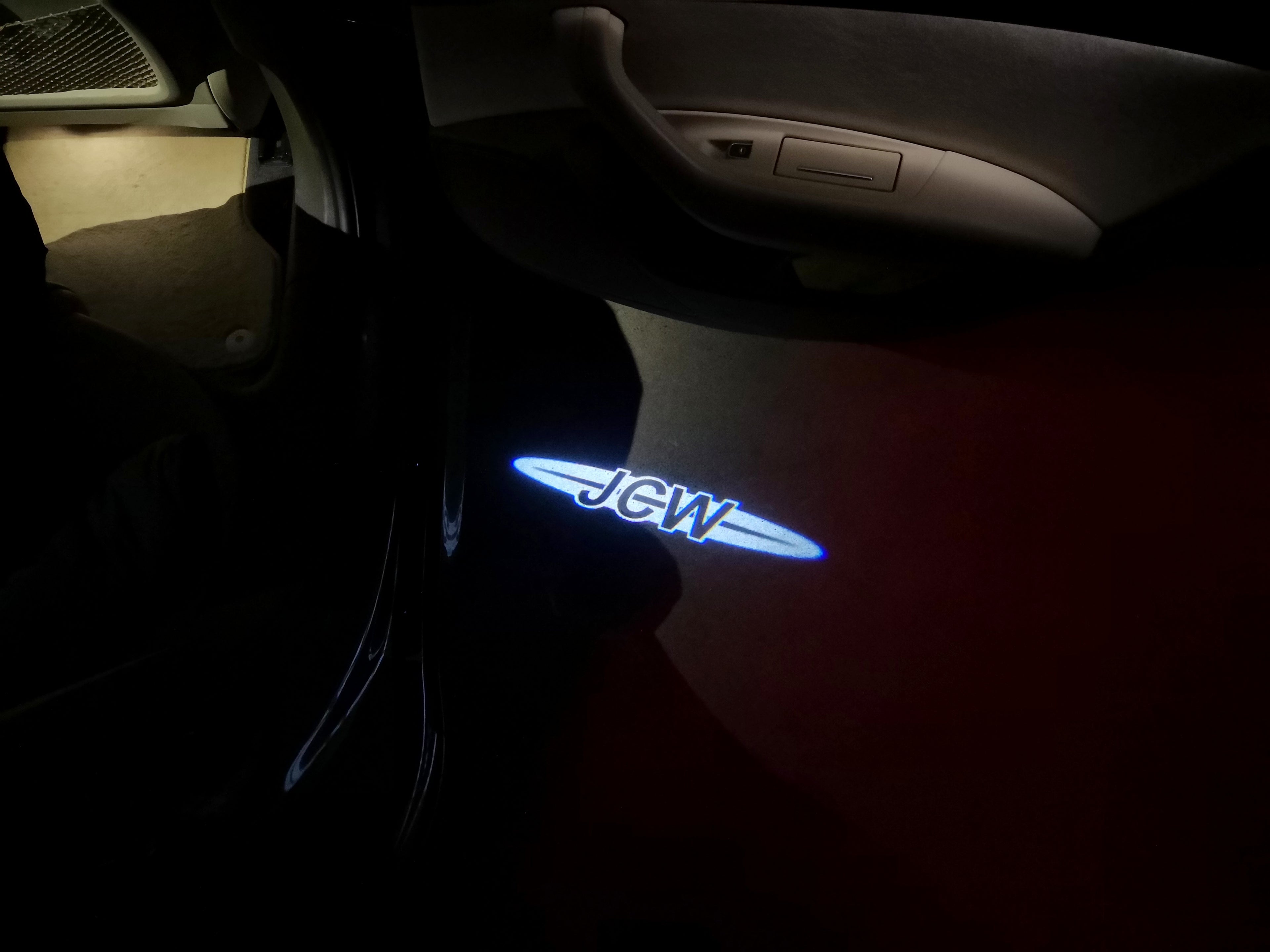 JOHN COOPER ARBEITET LOGO PROJECROTR LICHTER Nr.114 (Menge 1 = 2 Logo Film / 2 Türlichter)