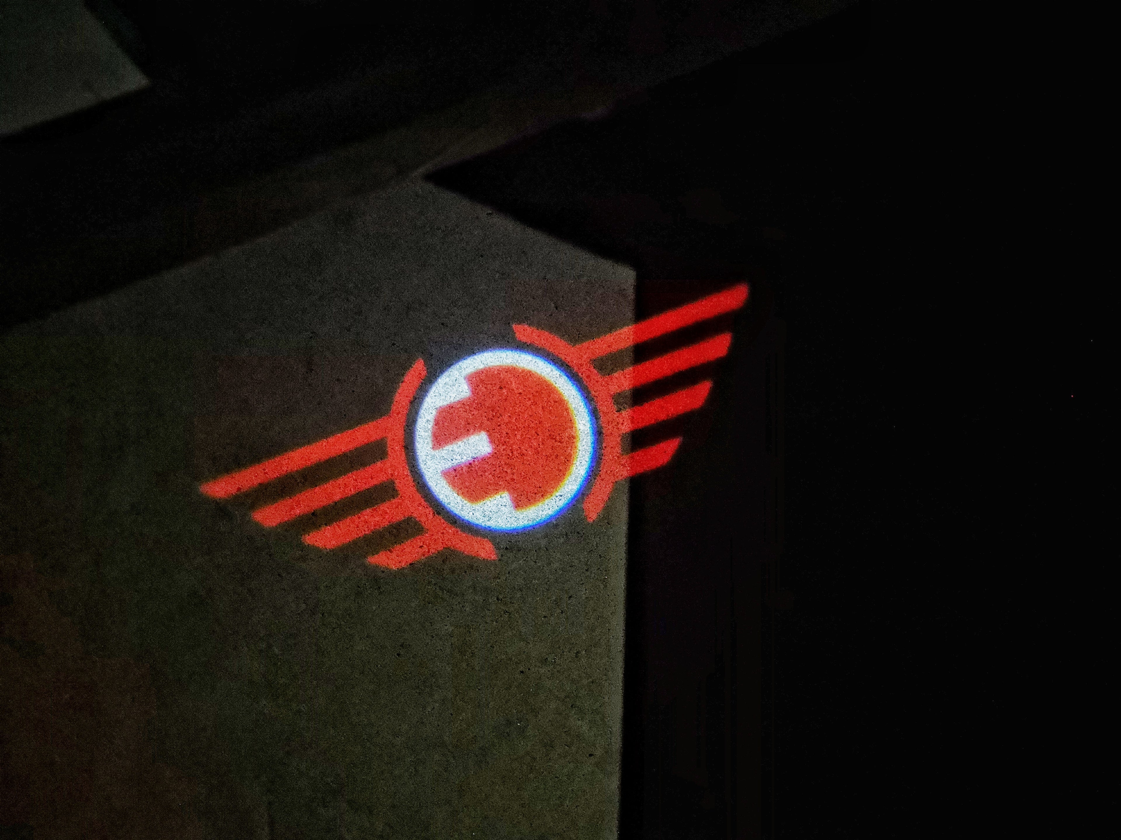 LUCI PROIETTORI MINI LOGO ELETTRICO Nr.99 (quantità 1 = 2 Logo Film / 2 luci porta)