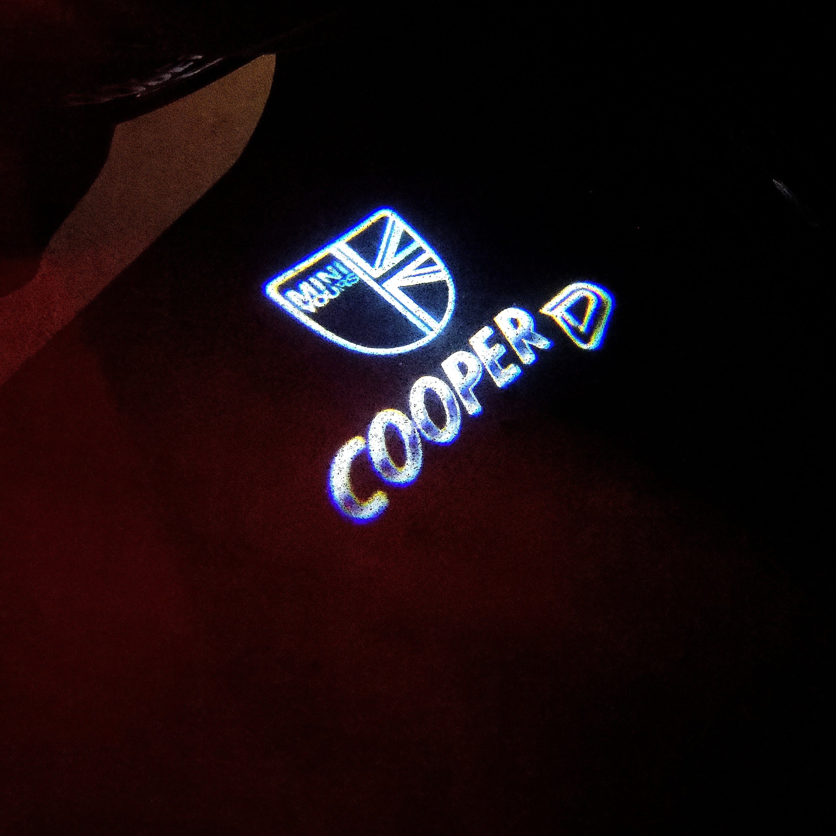 MINI COOPER D LOGO PROJECROTR LIGHTS Nr.39 (الكمية 1 = 2 Logo Film / 2 Door Lights)