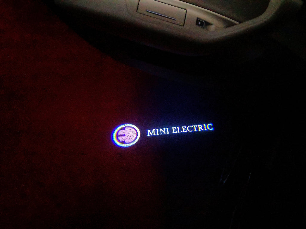 MINI ELECTRIC LOGO PROJECTOR LIGHTS Nr.61 (الكمية 1 = 2 شعار فيلم / 2 باب)