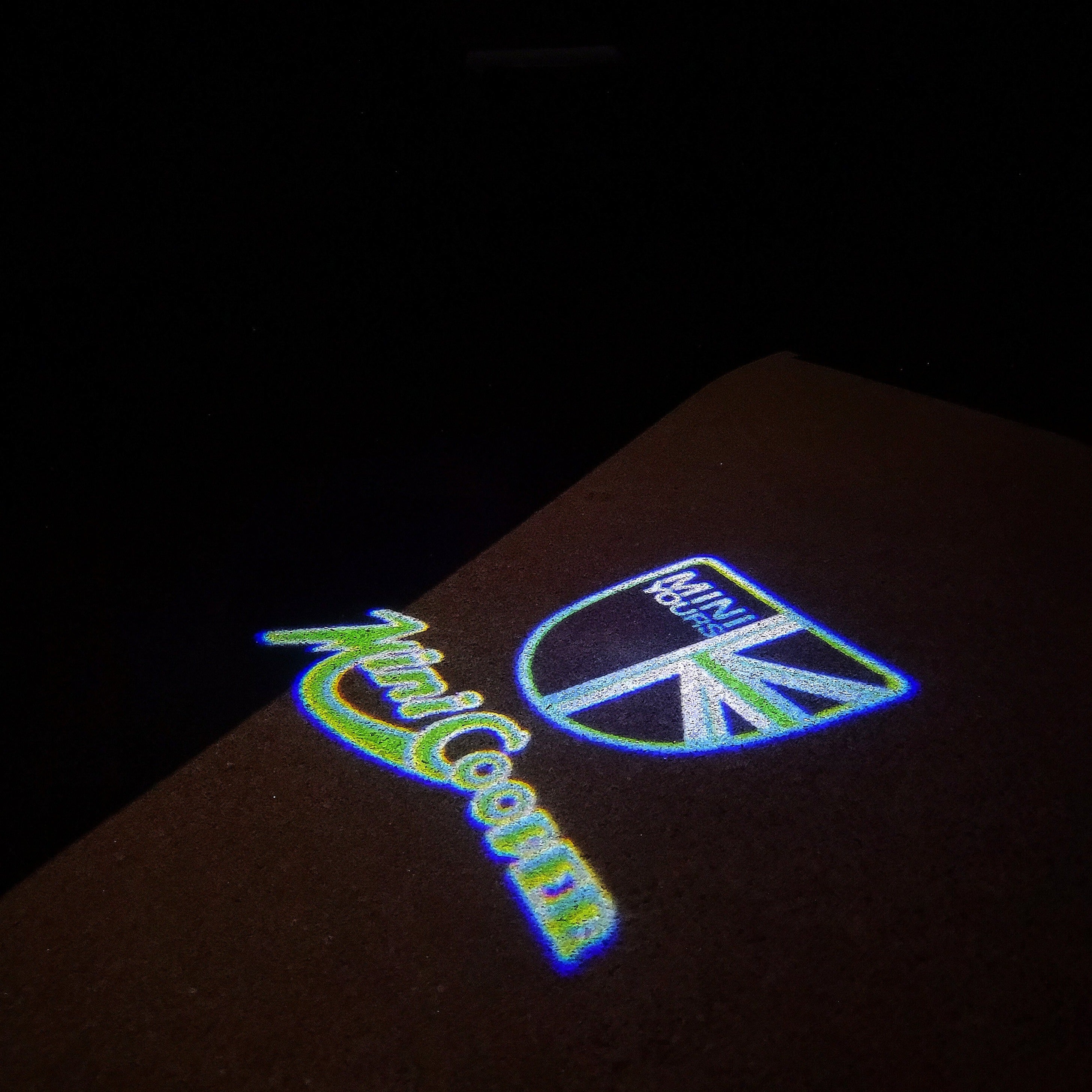 MINI COOPER LOGO PROJECROTR LIGHTS Nr.42 (الكمية 1 = 2 شعار فيلم / 2 مصباح باب)