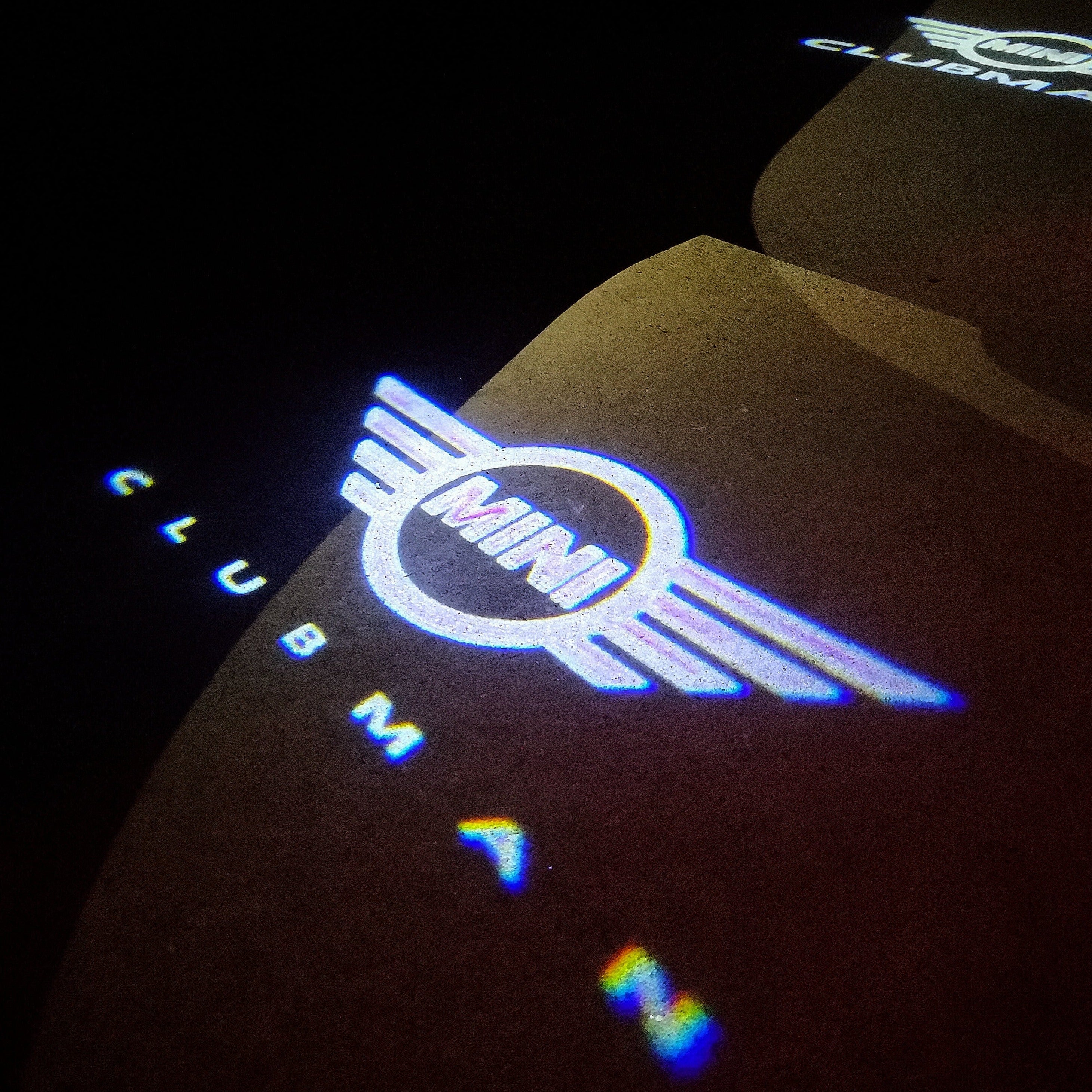 MINI CLUBMAN LOGO PROJECROTR LIGHTS Nr.143 (Menge 1 = 2 Logo Film / 2 Türleuchten)