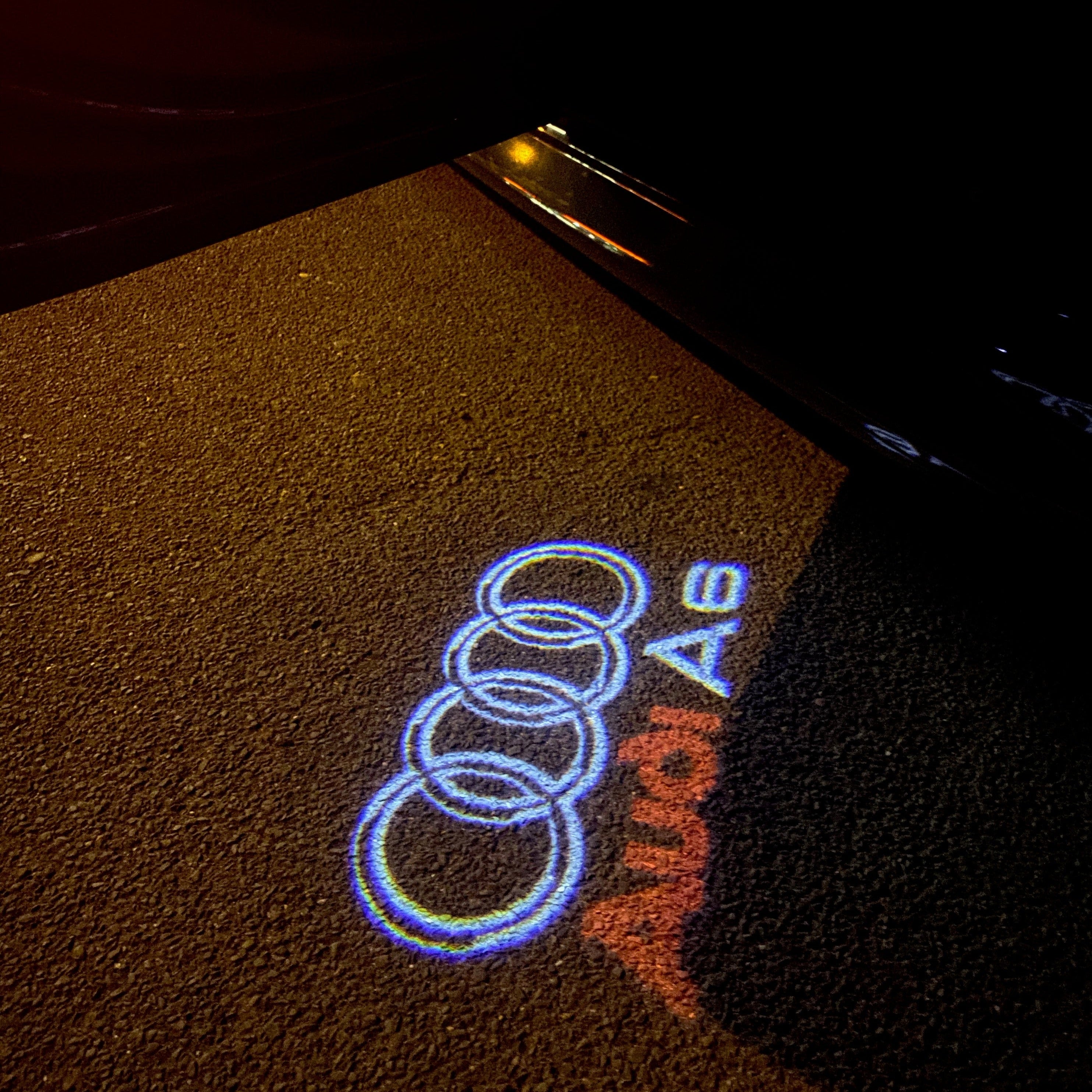 AUDI LOGO PROJECTOT LIGHTS Nr.44 (quantité 1 = 2 Logo Films /2 feux de porte)
