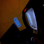 LUCI PROIETTORI LOGO AUDI Nr.08 (quantità 1 = 2 Pellicole Logo / 2 luci porta)