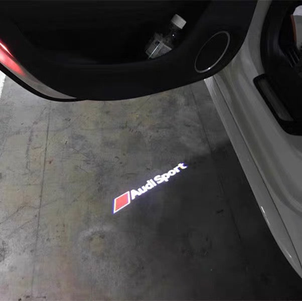 AUDI LOGO PROJECTOT LIGHTS Nr.69 (quantità 1 = 2 Logo Films /2 luci porta)