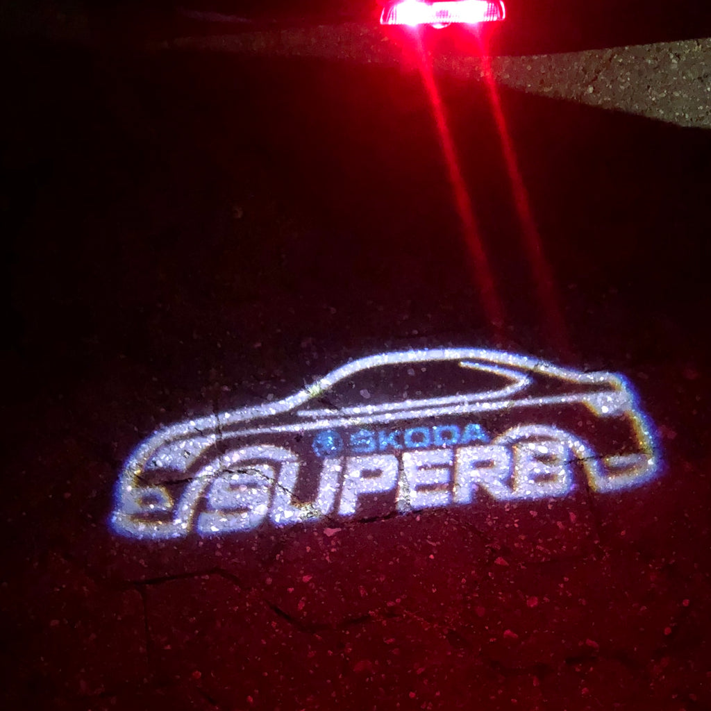 SKODA LOGO PROJECTOT LIGHTS Nr.69 (Menge 1 = 2 Logo Film / 2 Türleuchten)