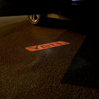 LUCES CON LOGO SKODA YETI Nr.56 (cantidad 1 = 2 Película con Logo / 2 luces de puerta)