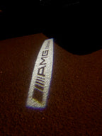 MERCEDES BENZ AMG LOGO PROJECTOR LIGHTS Nr.15 (الكمية 1 = 1 مجموعة / 2 أضواء باب)