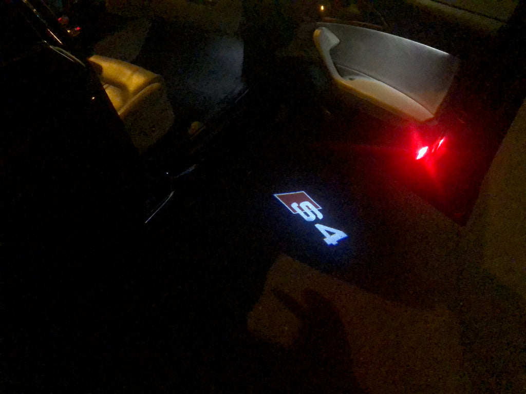 AUDI LOGO PROJECTOT LIGHTS Nr.25 (quantité 1 = 2 Logo Films /2 feux de porte)
