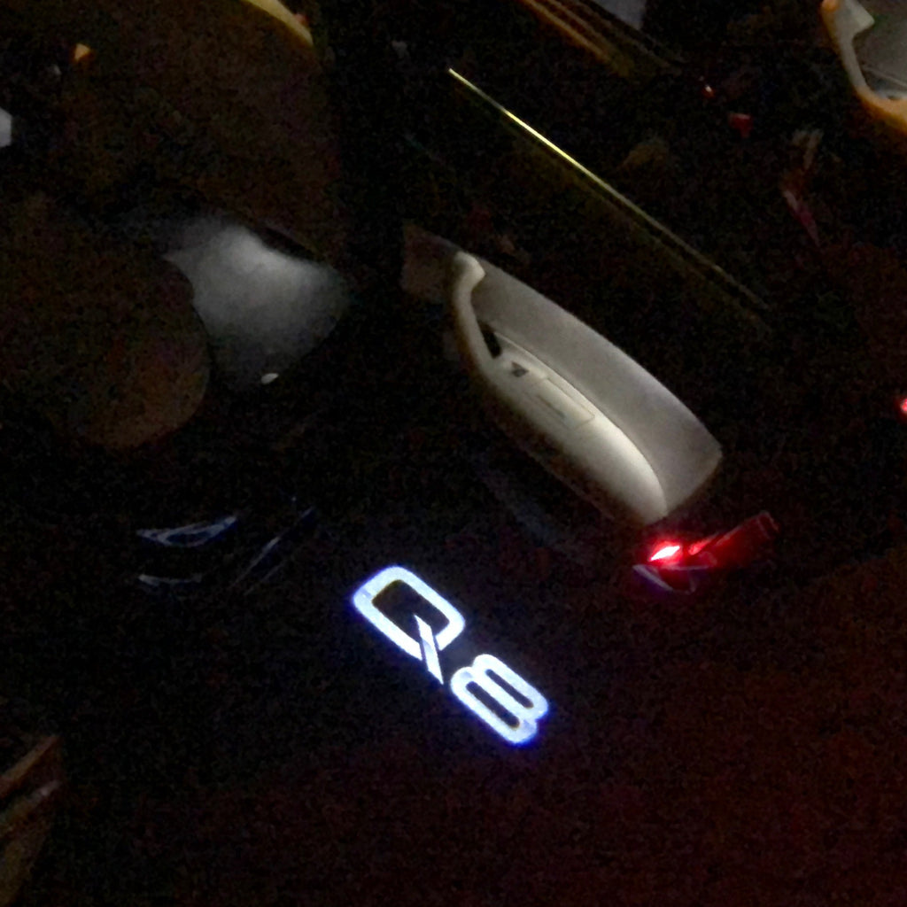 AUDI LOGO PROJECTOT LIGHTS Nr.102 (Menge 1 = 2 Logofolien /2 Türleuchten)