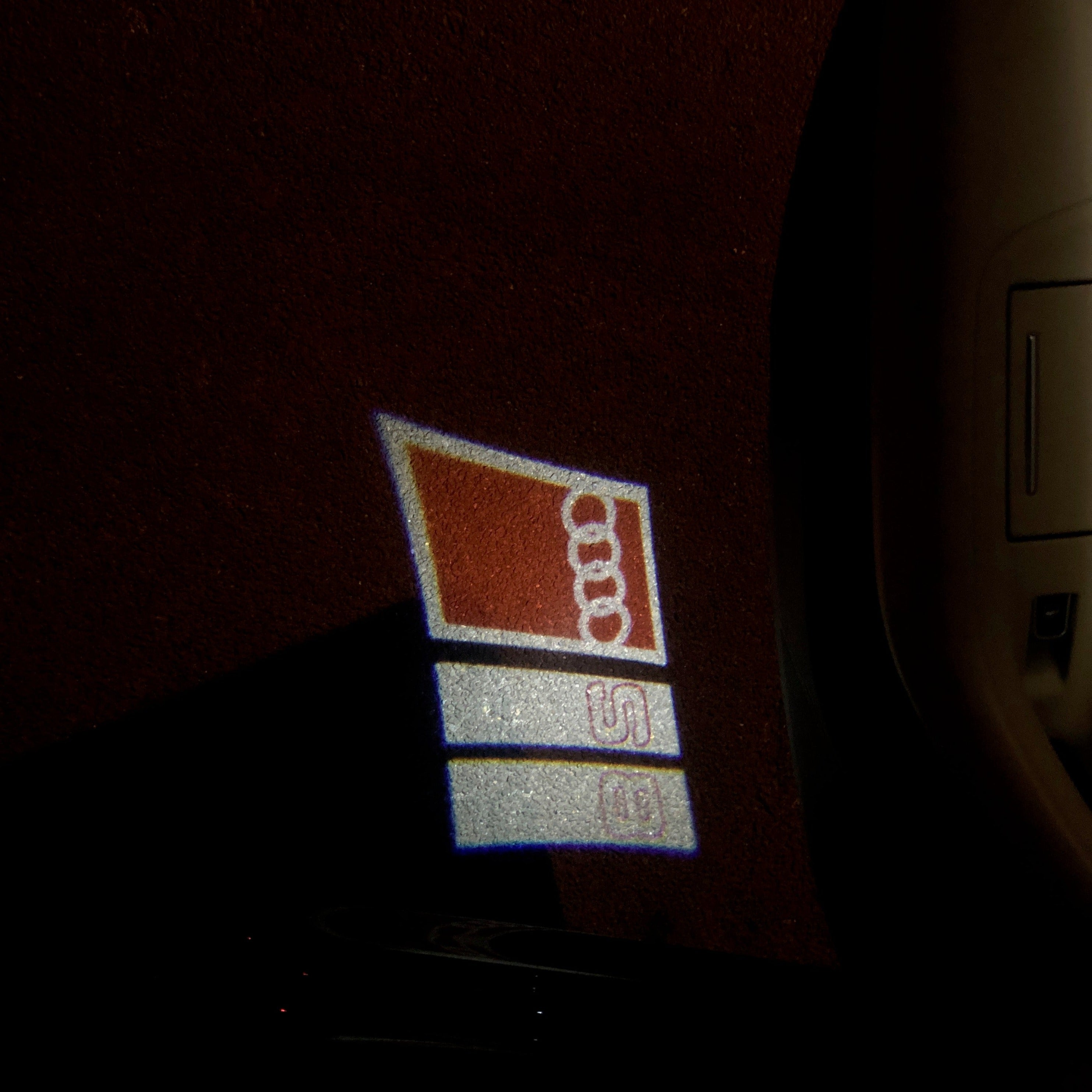 AUDI LOGO PROJECTOT LIGHTS Nr.103 (quantité 1 = 2 Logo Films /2 feux de porte)
