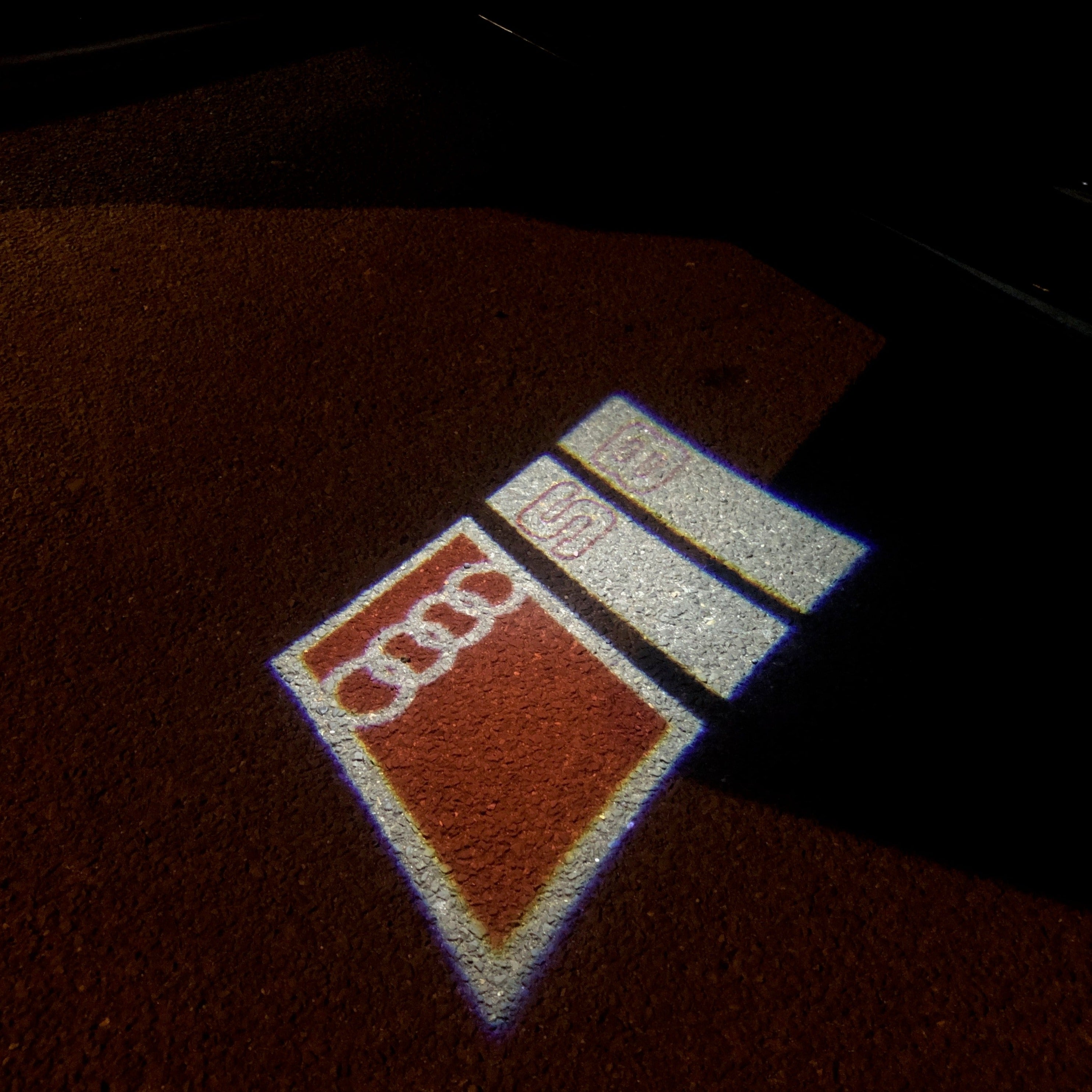 AUDI LOGO PROJECTOT LIGHTS Nr.103 (quantité 1 = 2 Logo Films /2 feux de porte)