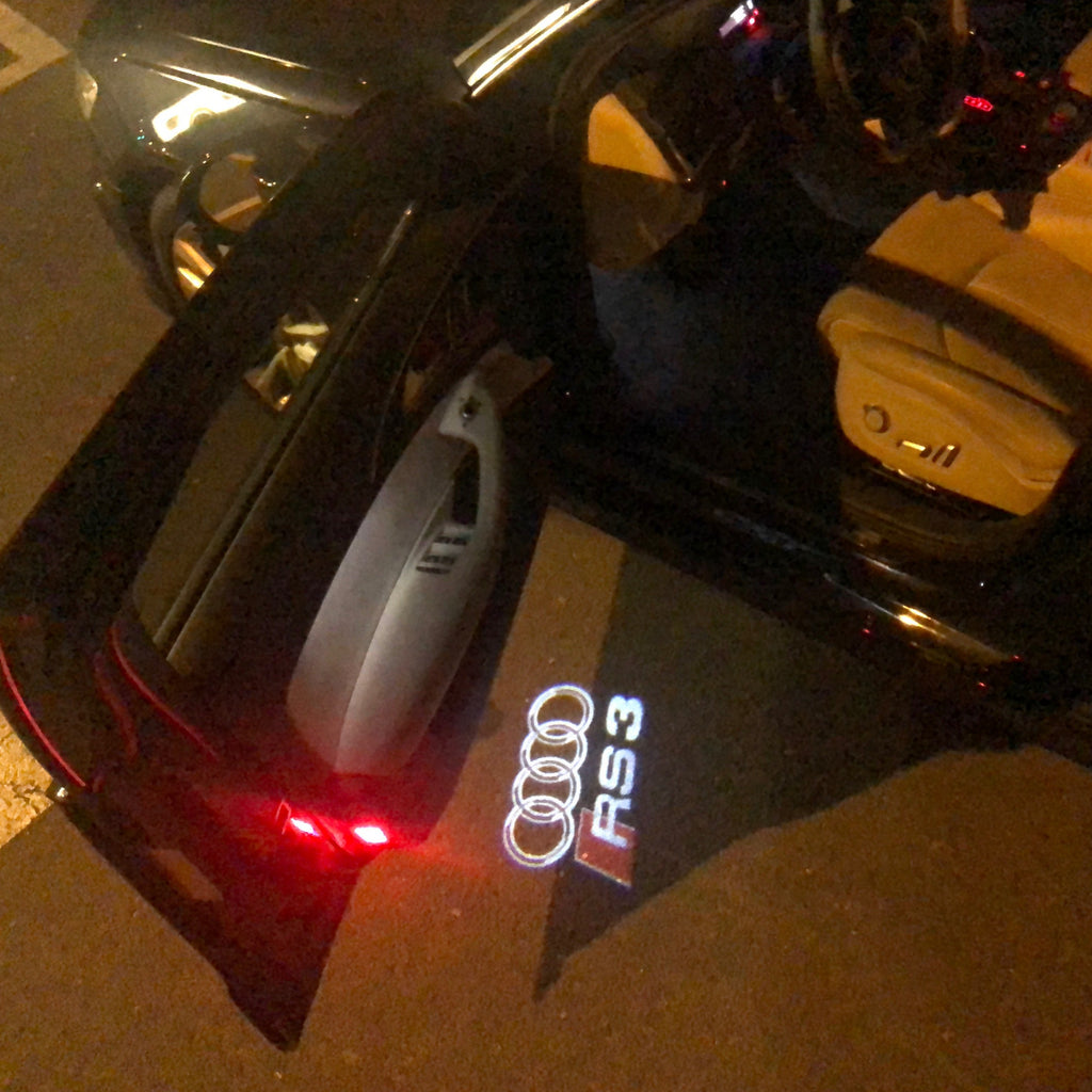 AUDI LOGO PROJECTOT LIGHTS Nr.128 (Quantität 1 = 2 Logofilme / 2 Türleuchten)