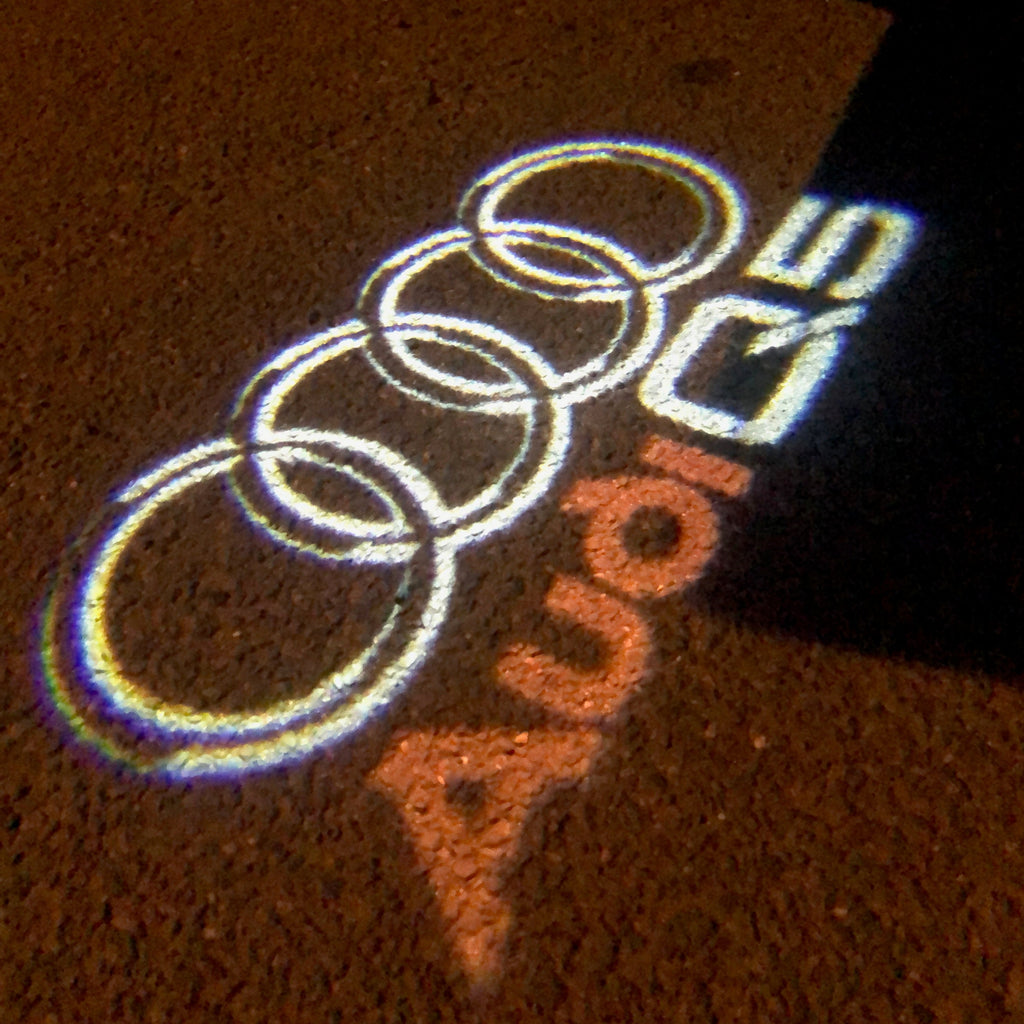 PROJECTEUR AUDI LOGO LIGHTS Nr.48 (quantité 1 = 2 Logo Films / 2 portes lumières)