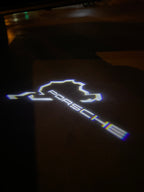 LUCI PROIETTORI LOGO ORIGINALI PORSCHE Nr.03 (quantità 1 = 2 Logo Film / 2 luci porta)