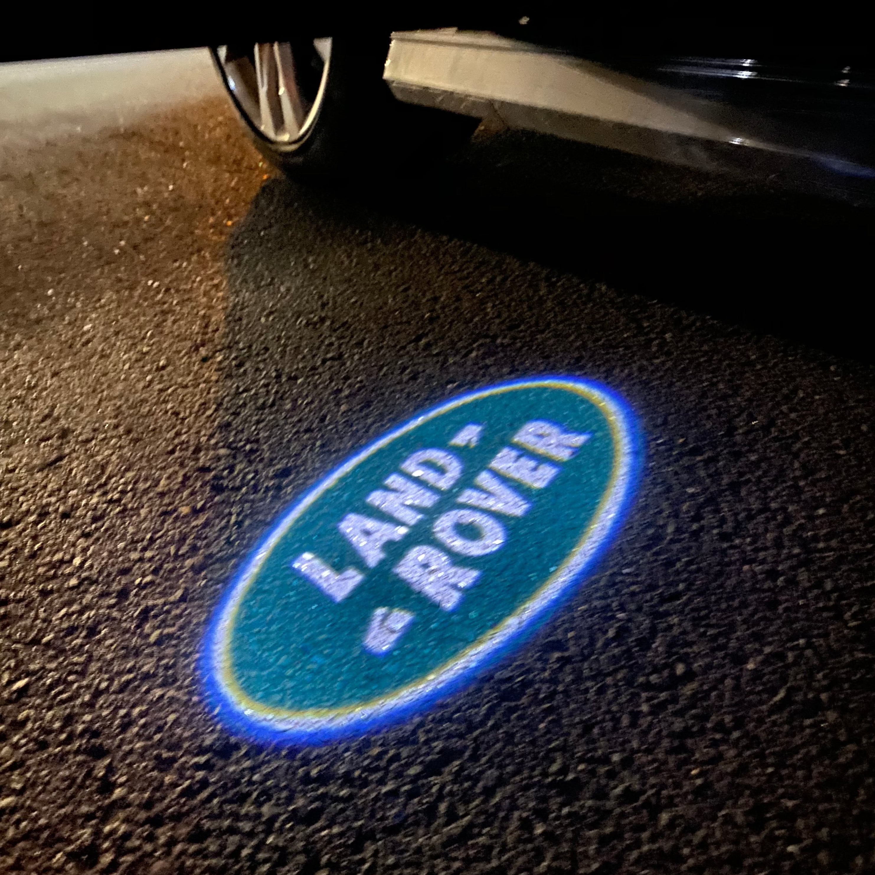 Land Rover  ORIGINAL  LOGO PROJECROTR LIGHTS Nr.1144 (quantity 1 = 1 sets/2 door lights)